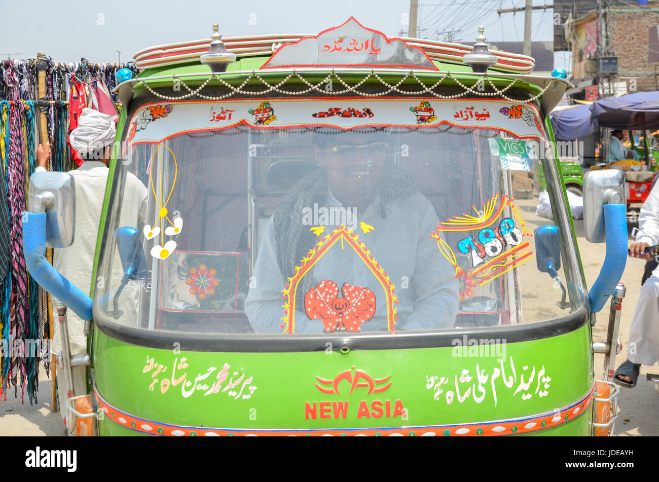 Pakistani Rikshaws Rikshaws in Lahore Roads, Punjab, Pakistan on 22 May 2017 Stock Photo ...
