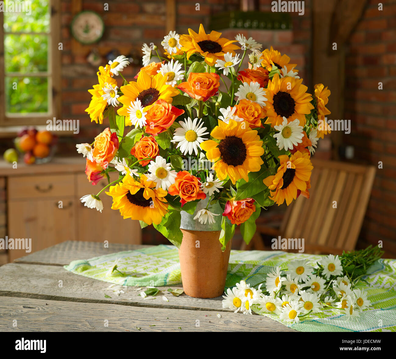Bouquet Of Flowers With Sunflowers And Roses Stock Photo