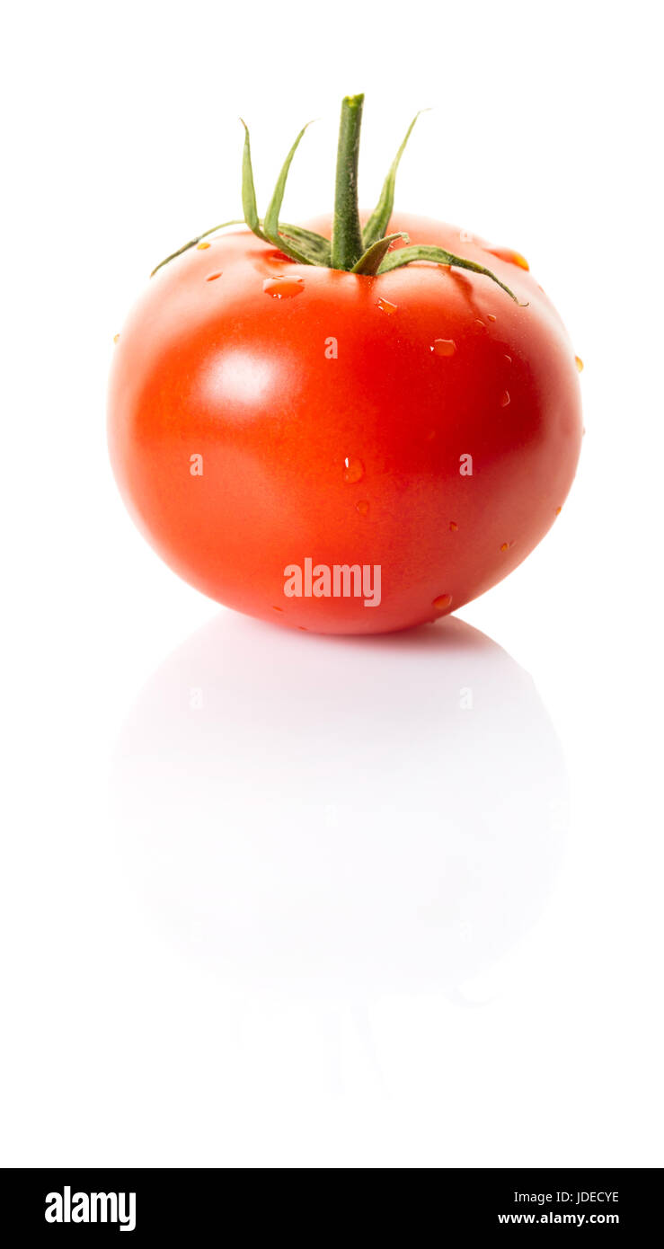 Ripe tomato with water drops on white isolated background Stock Photo ...