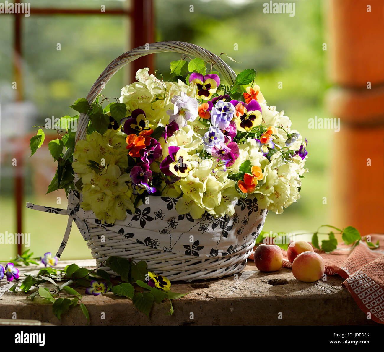 Bouquet of flowers with azaleas and pansies. Stock Photo