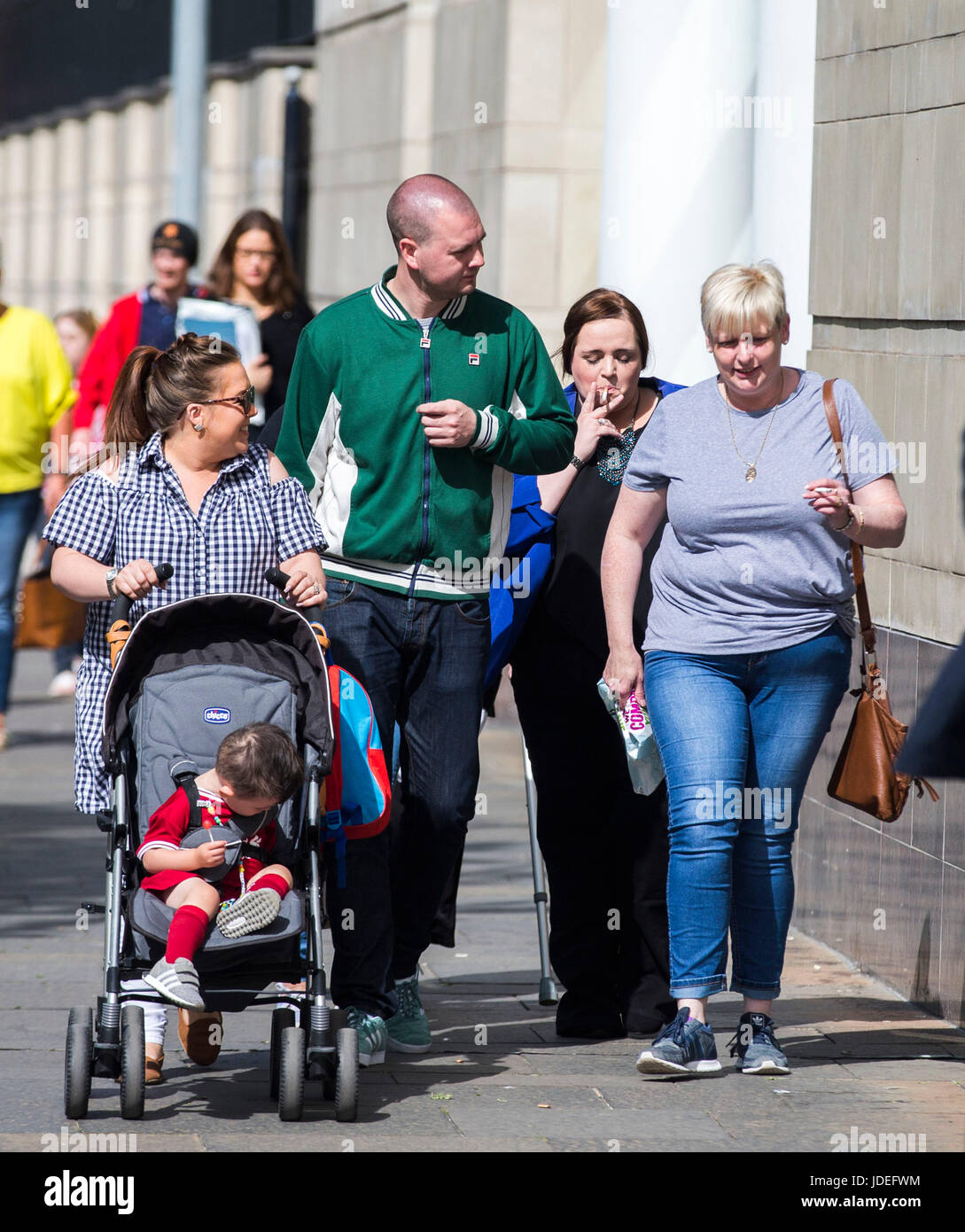 Christine Connor (second right) walking to Laganside Courts, Belfast accompanied by unknown people where she is due to be sentenced after she posed as a Swedish model to entrap two men into taking part in her bid to murder police officers. Stock Photo