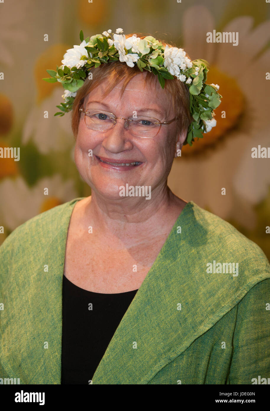 TARJA HALONEN former Finish president with flower ring on the head 2017 Stock Photo
