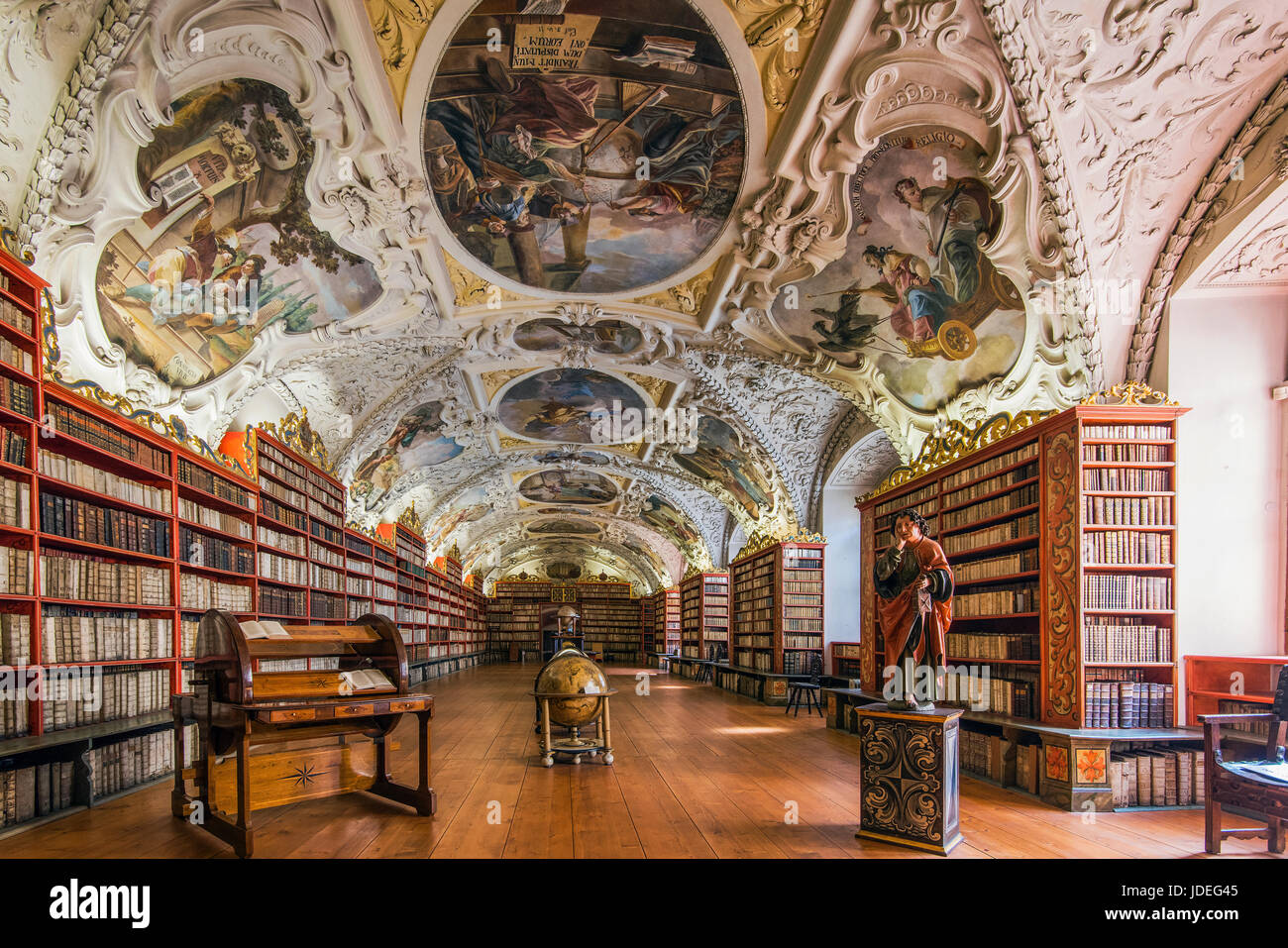 The Theological Hall with library and stucco decoration and paintings dated from 1720s, Strahov Monastery, Prague, Bohemia, Czech Republic Stock Photo