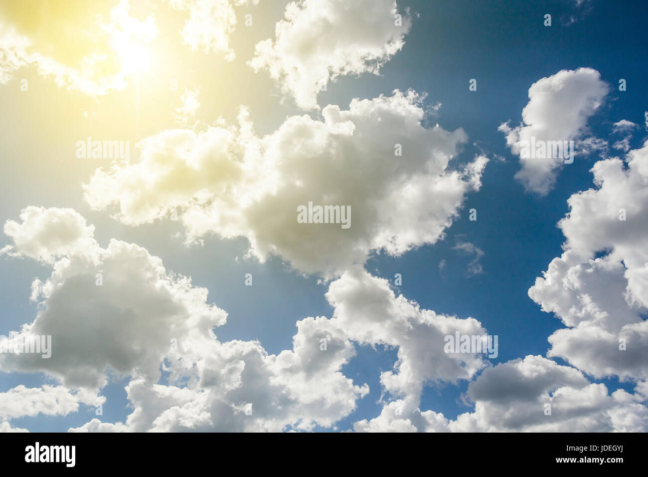 White big clouds on background of blue sky Stock Photo - Alamy