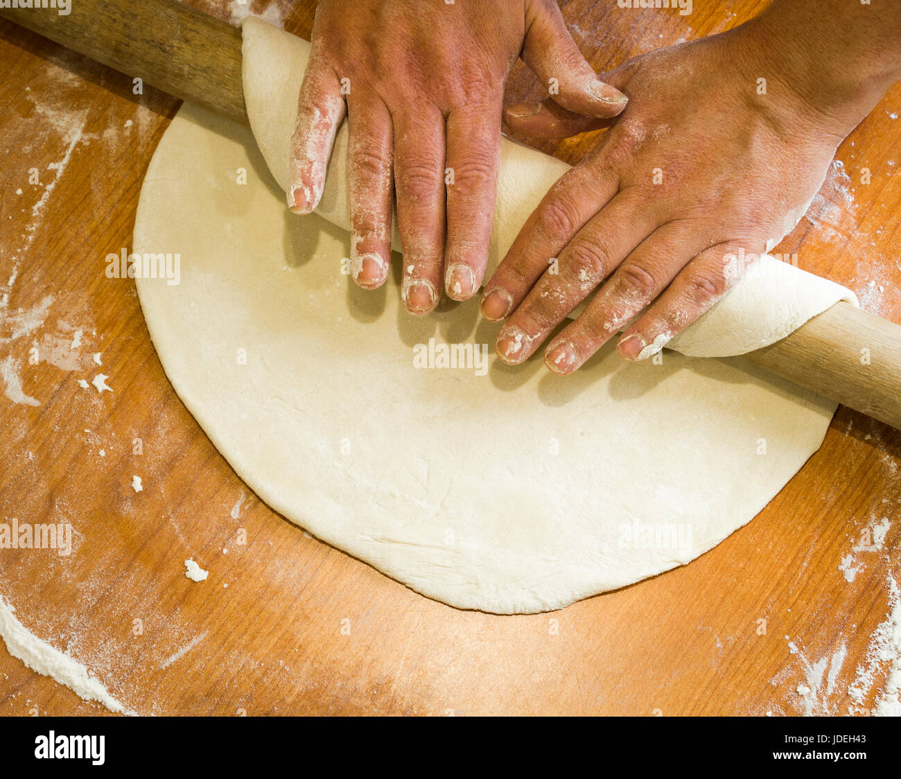Manual rolling dough for making dumplings closeup Stock Photo Alamy