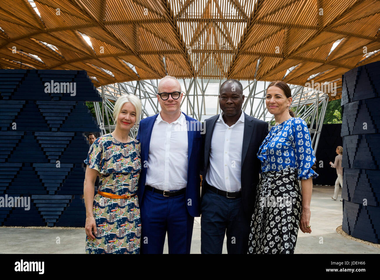 London, UK. 20 June 2017. L-R: Justine Simons, Deputy Mayor, Deputy Mayor, Culture and the Creative Industries, Hans-Ulrich Obrist, Artistic Director, Serpentine Galleries, Francis Kere, Architect, and Yana Peel, CEO, Serpentine Galleries. Diebedo Francis Kere, the award-winning architect from Gando, Burkina Faso, has designed the Serpentine Pavilion 2017, next to the Serpentine Gallery in Kensington Gardens. Kere leads the Berlin-based practice Kere Architecture. He is the 17th architect to accept the Serpentine Gallery's invitation to design a temporary Pavilion in its grounds. The Pavilion  Stock Photo