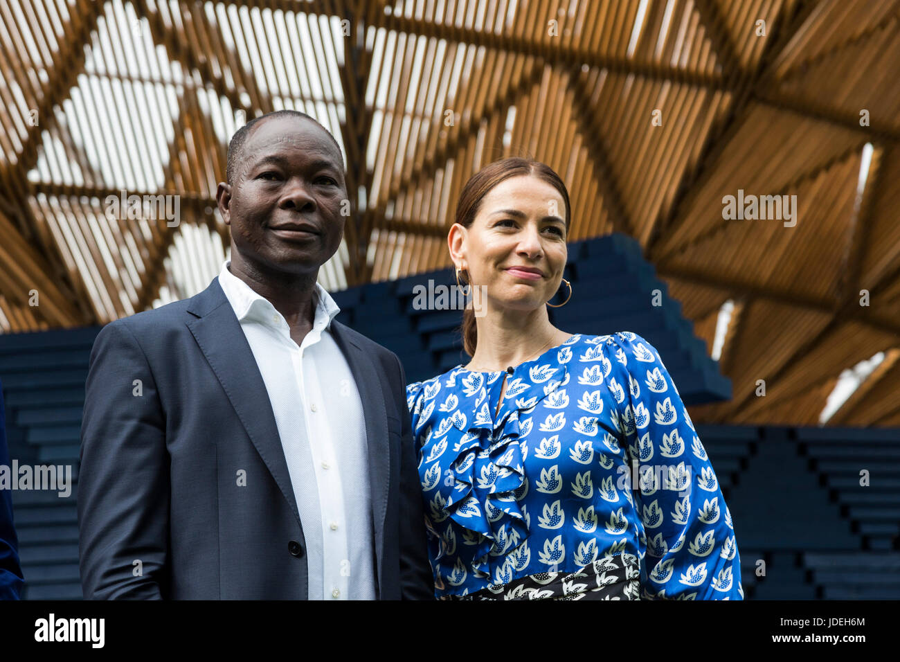 London, UK. 20 June 2017. L-R: Francis Kere and Yana Peel, CEO, Serpentine Galleries. Diebedo Francis Kere, the award-winning architect from Gando, Burkina Faso, has designed the Serpentine Pavilion 2017, next to the Serpentine Gallery in Kensington Gardens. Kere leads the Berlin-based practice Kere Architecture. He is the 17th architect to accept the Serpentine Gallery's invitation to design a temporary Pavilion in its grounds. The Pavilion is open to the public from 23 June to 8 October 2017. Stock Photo