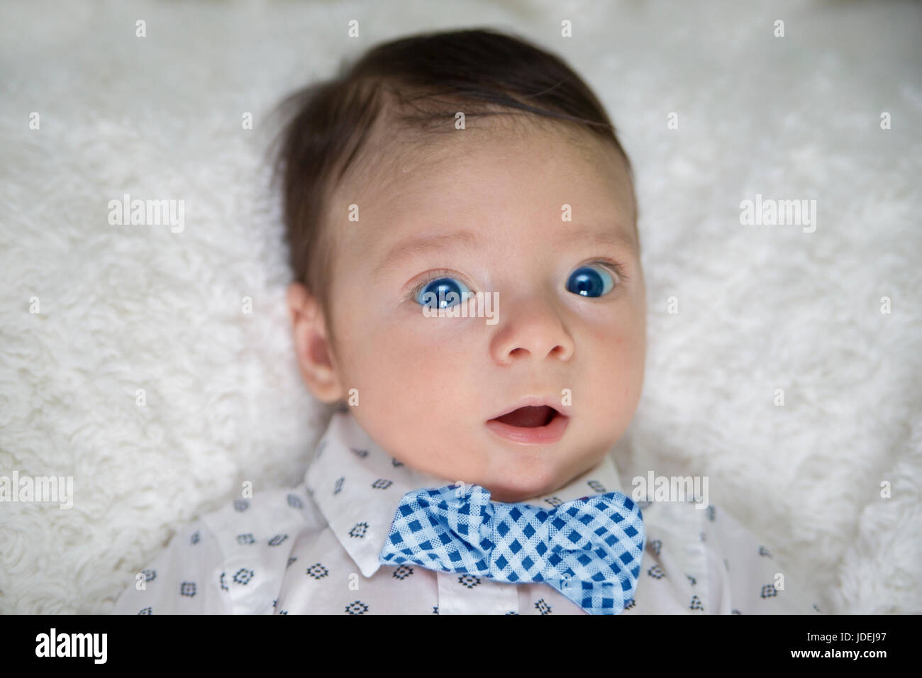 Newborn baby boy blue eyes hires stock photography and images Alamy