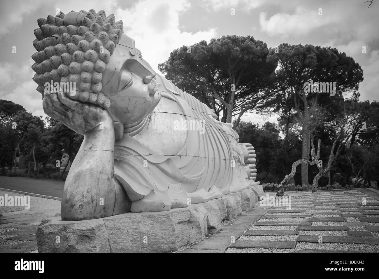 Amazing Sculptured Buddha in a zen garden Stock Photo Alamy