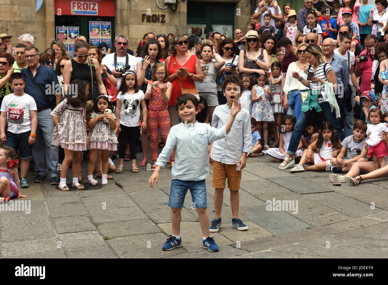 People watching fiesta on the streets of Santiago de Compostela in Galicia Norther Spain Stock Photo