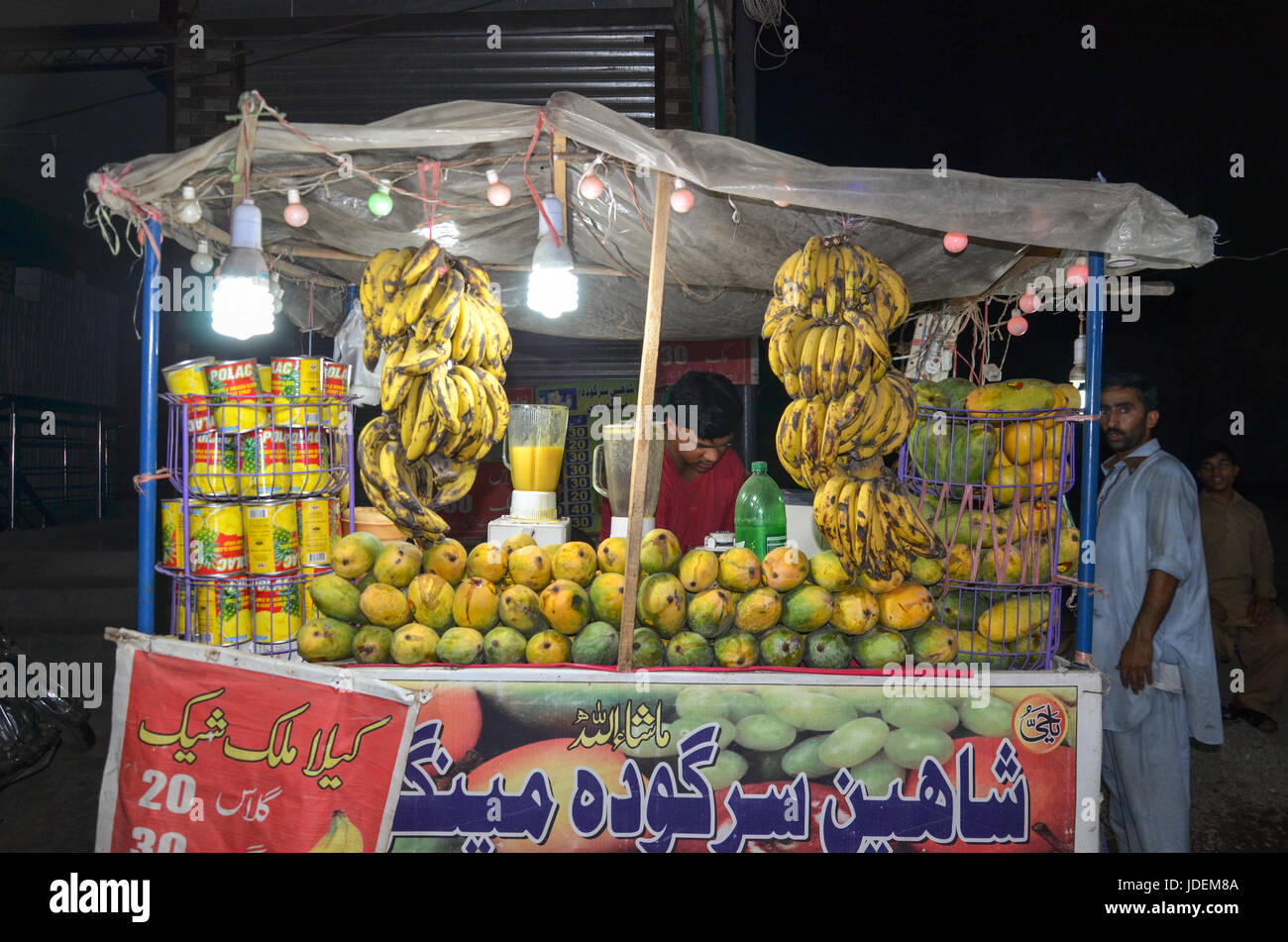 Pakistan market pakistani vendor hires stock photography and images