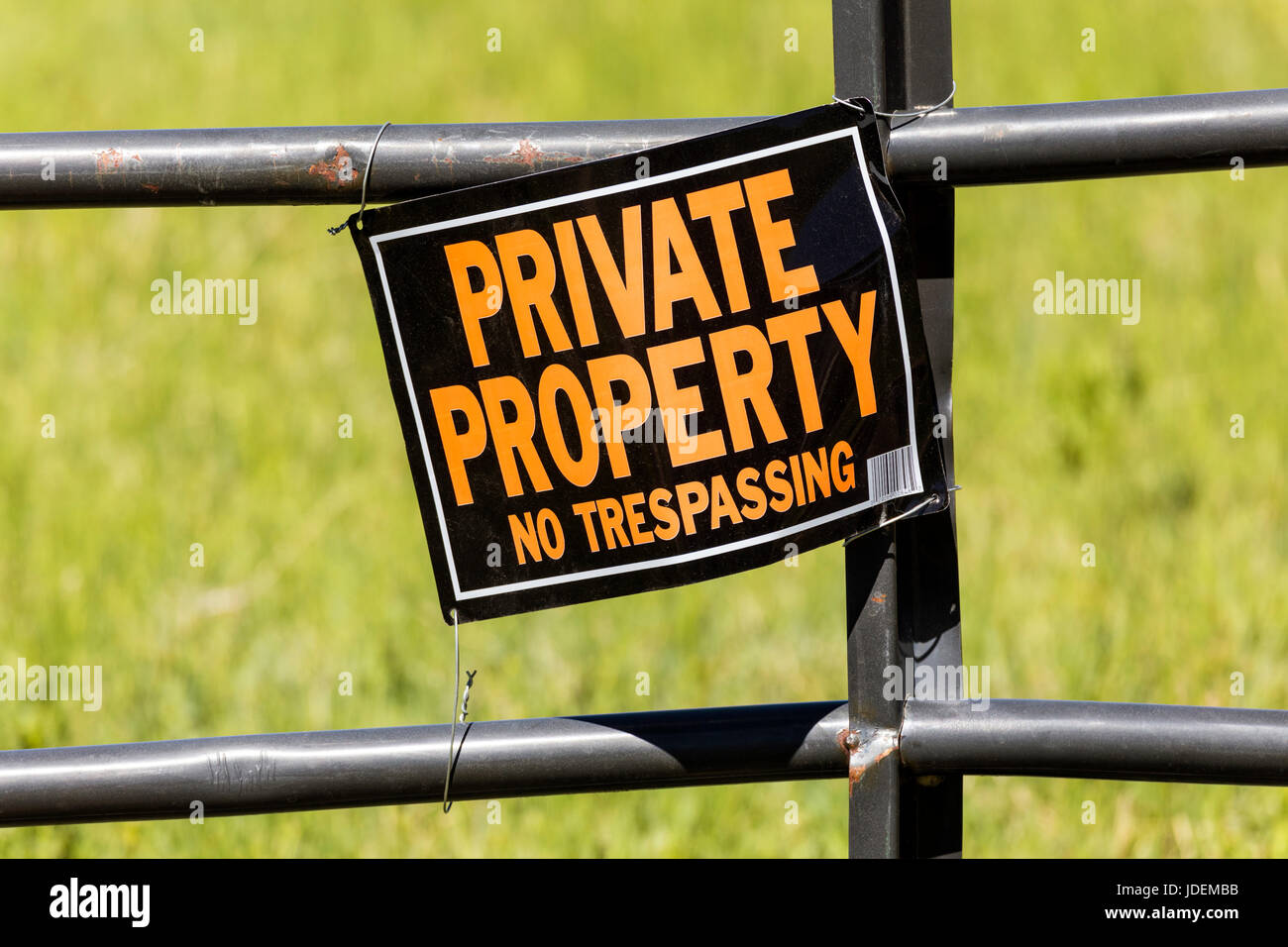 "Private Property" sign on fence on ranch property Stock Photo