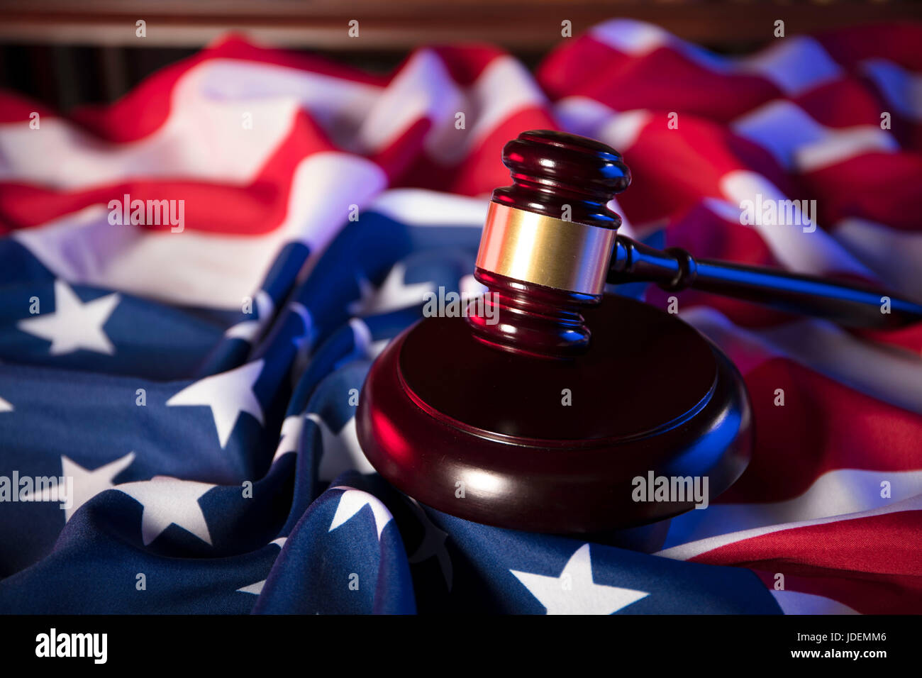 Independence Day theme. 4th of July. American Declaration of Independence. Gavel, library, different codes. American flag. Red and blue. Place for typ Stock Photo