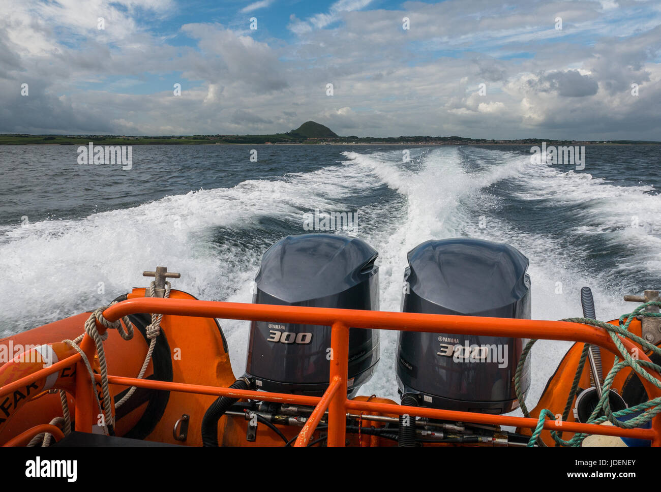 Twin boat engines on Seafari rigid inflatable boat, North Berwick, Firth of Forth, Scotland, showing boat speed and boat wake Stock Photo
