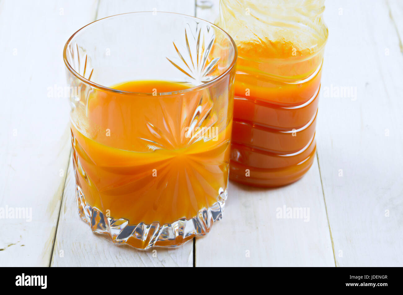 Download Carrot Juice In Glass And Plastic Bottle On White Background Stock Photo Alamy PSD Mockup Templates
