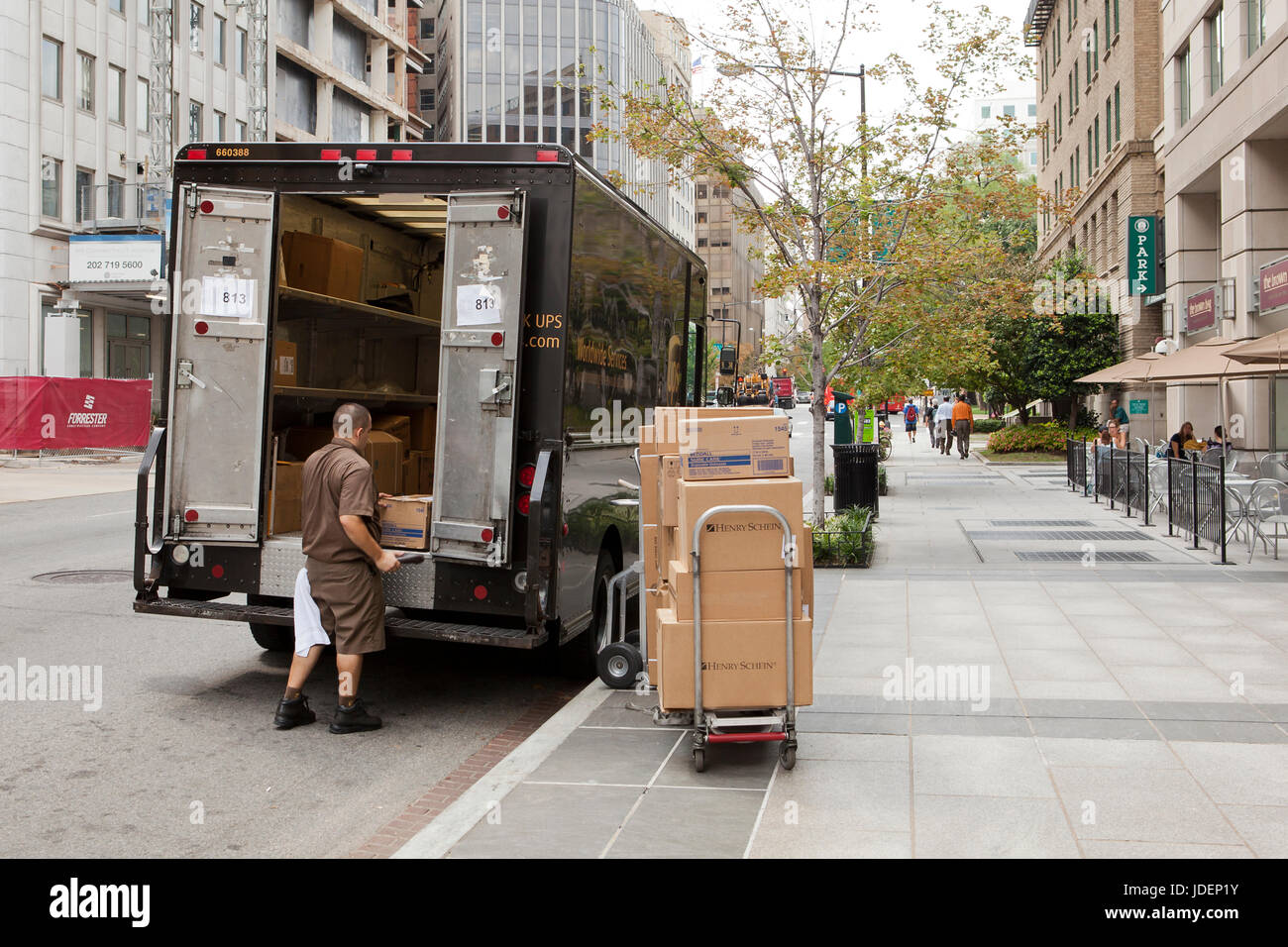 UPS delivery man preparing packages for delivery - Washington, DC 