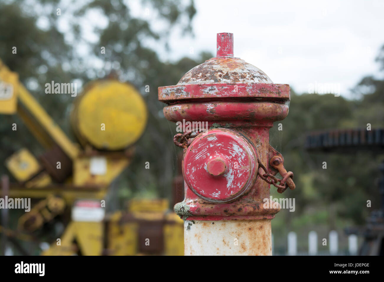 Old rusting and peeling pillar water hydrant at the Whispering Wall, Barossa Reservoir in Williamstown, South Australia.. Shallow depth of field and f Stock Photo