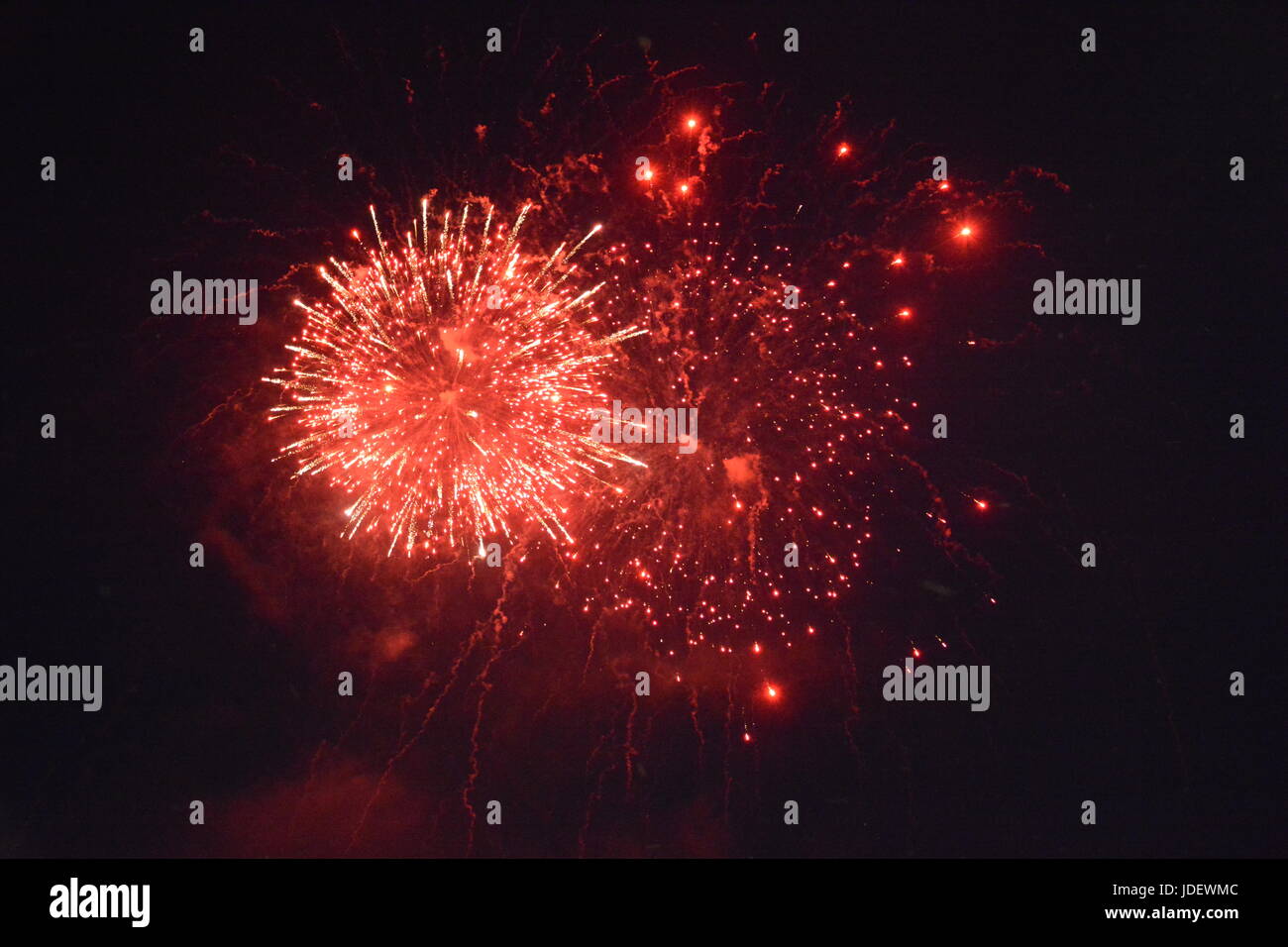 Big red  fireworks in the black night sky Stock Photo