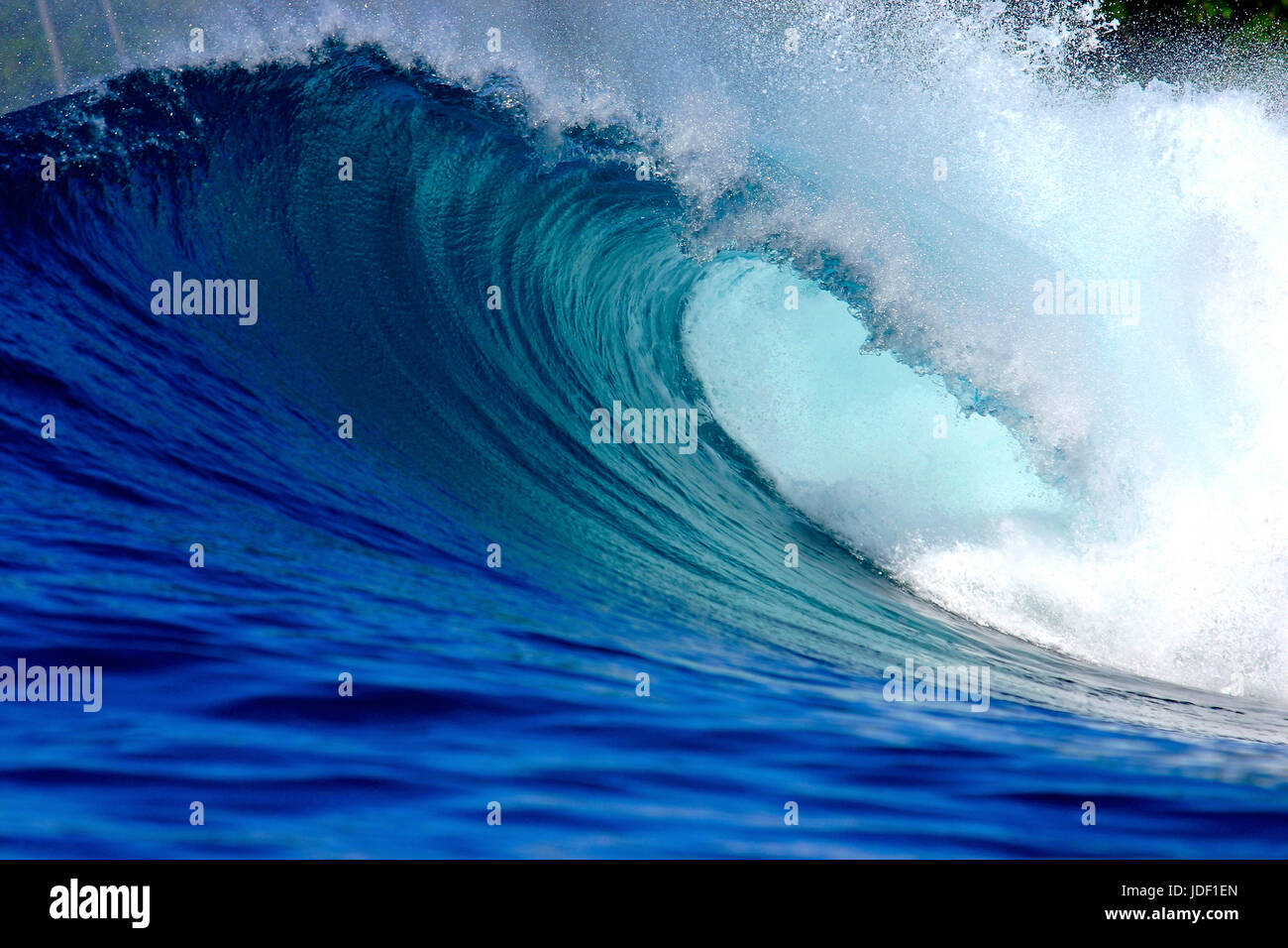 Blue ocean surfing wave Stock Photo