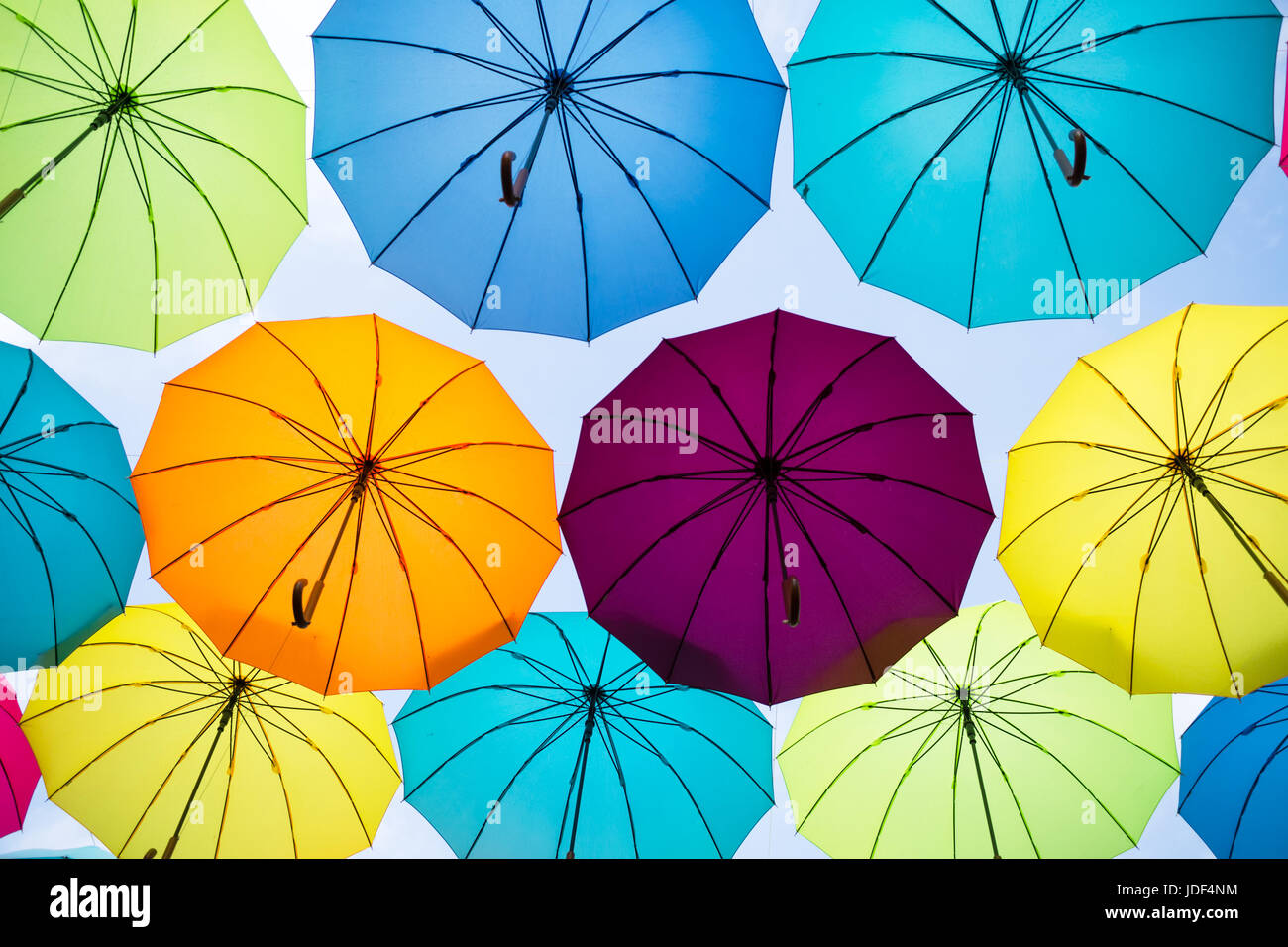 Colorful umbrellas hanging in the sky Stock Photo Alamy