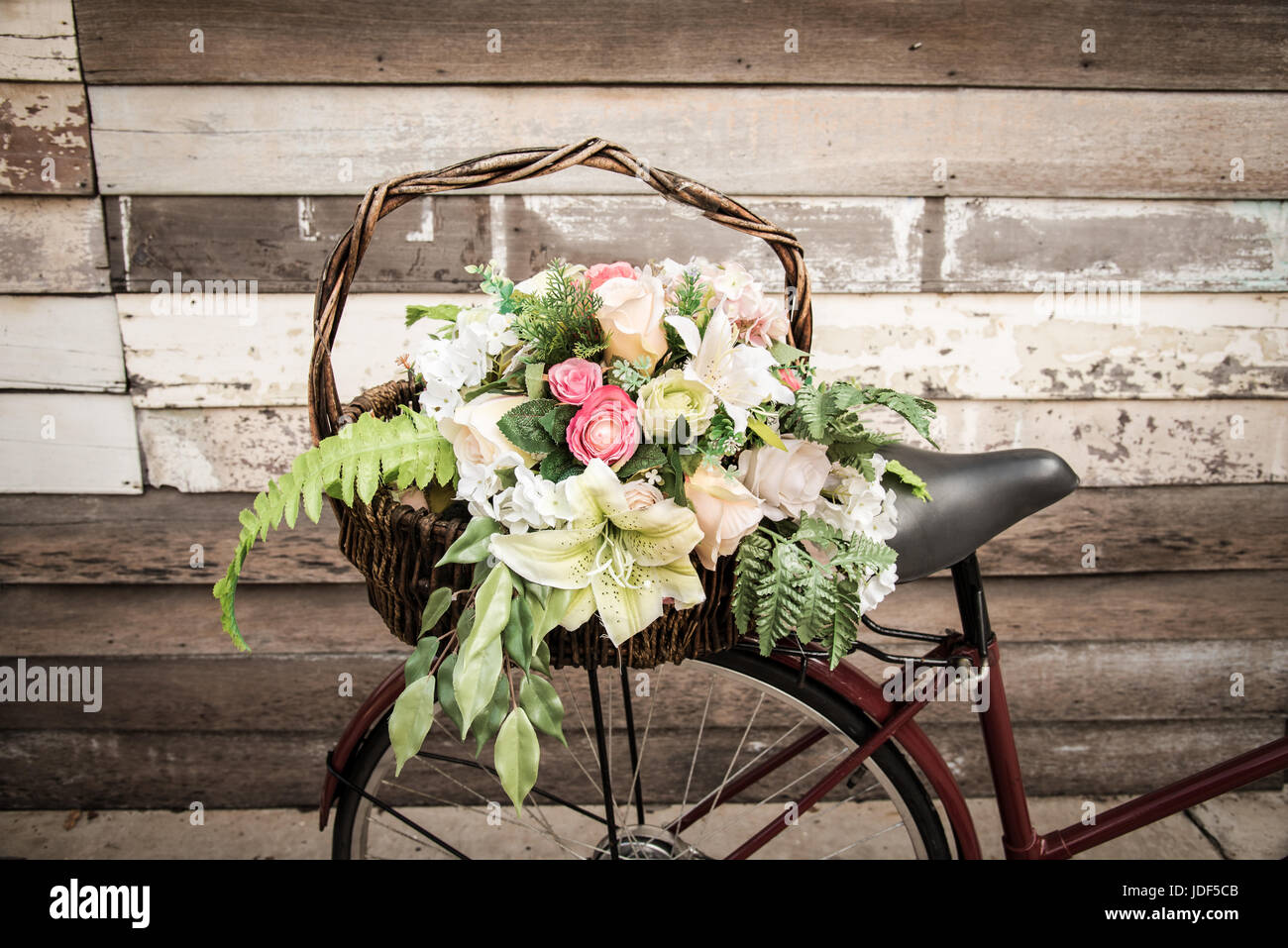 Vintage bicycle with flower basket Stock Photo Alamy
