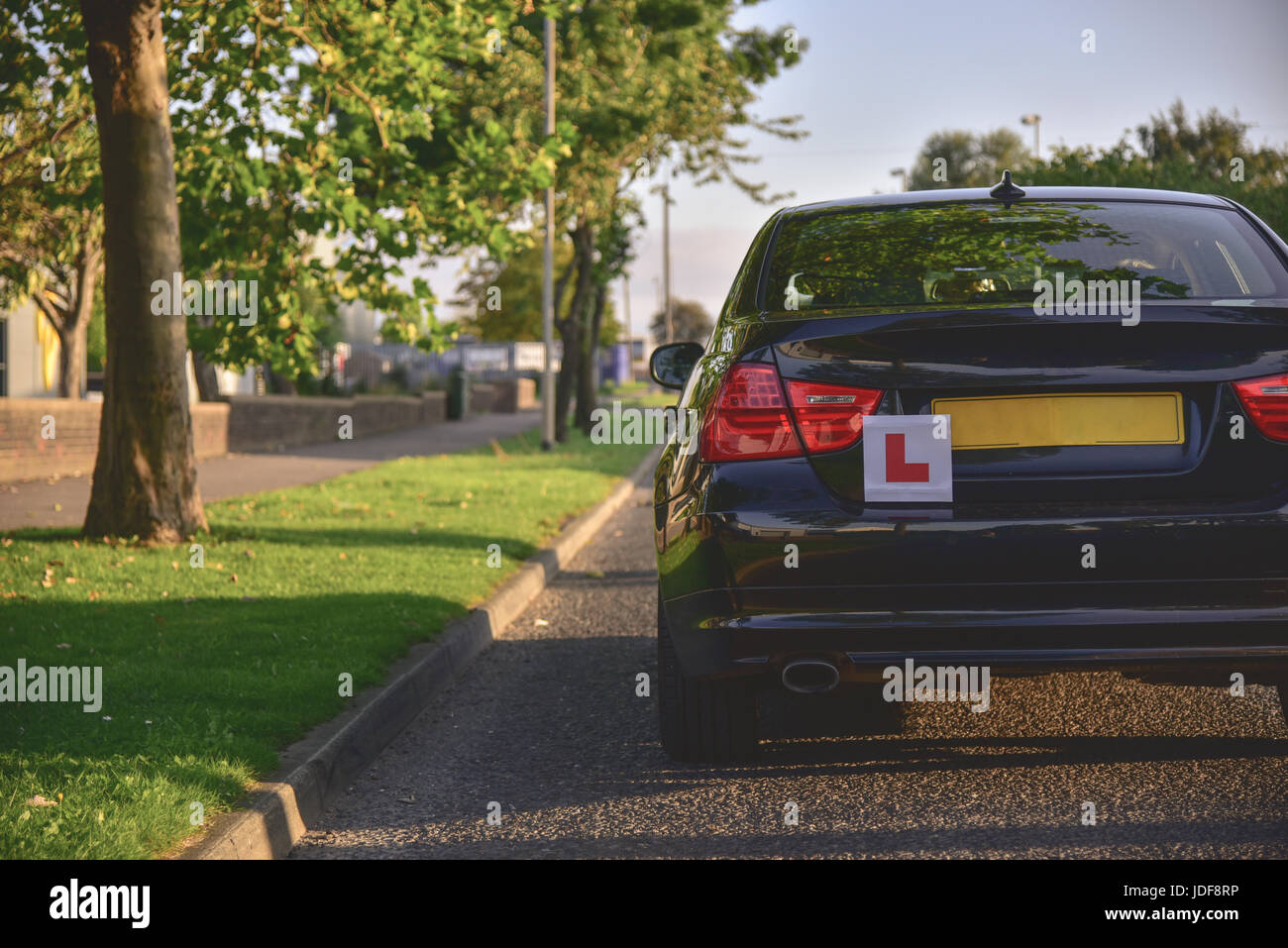A car with the L plates on ready for a new driver to use. Stock Photo