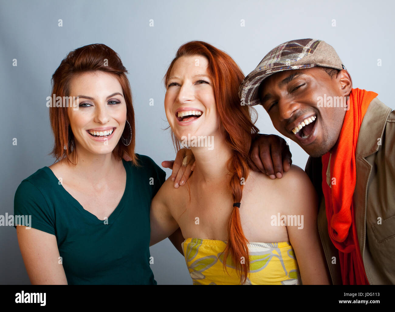 Young friends laughing and hanging out. Stock Photo