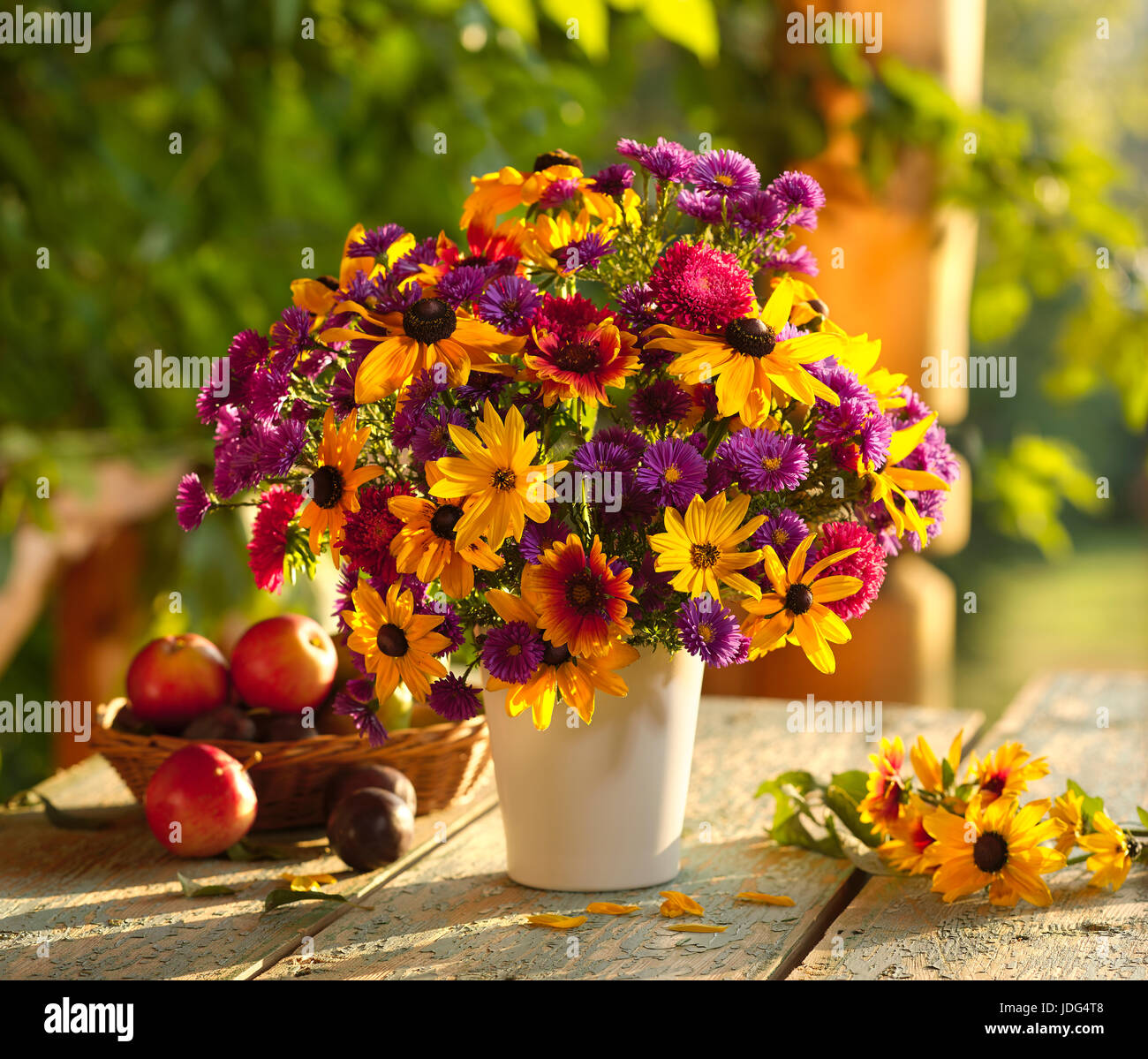 Bouquet of flowers with asters and sunflowers. Stock Photo