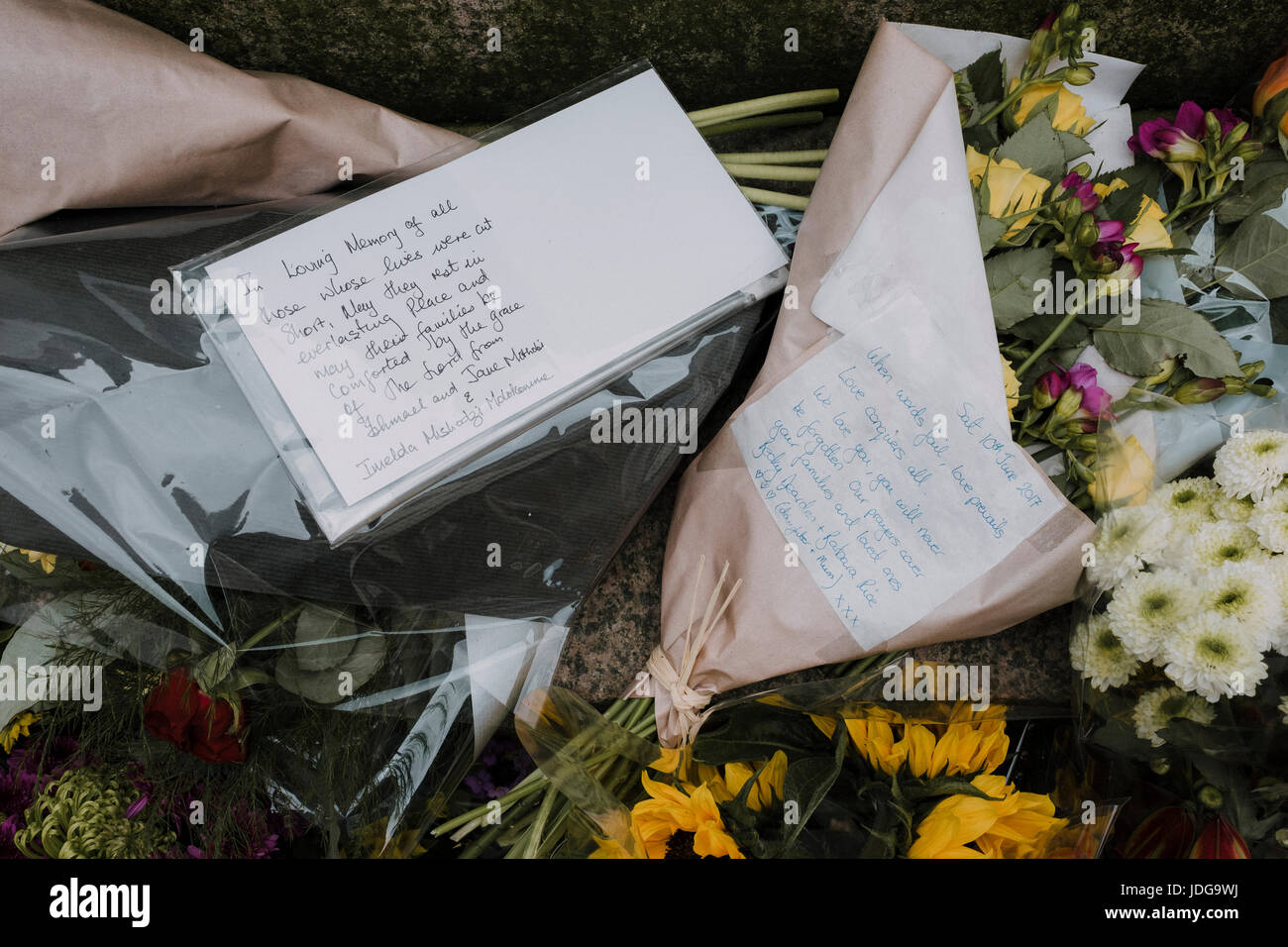 Memorials left at St Ann's Square for the victims of the Manchester Arena terror attack on 22nd May 2017 and their friends and families Stock Photo