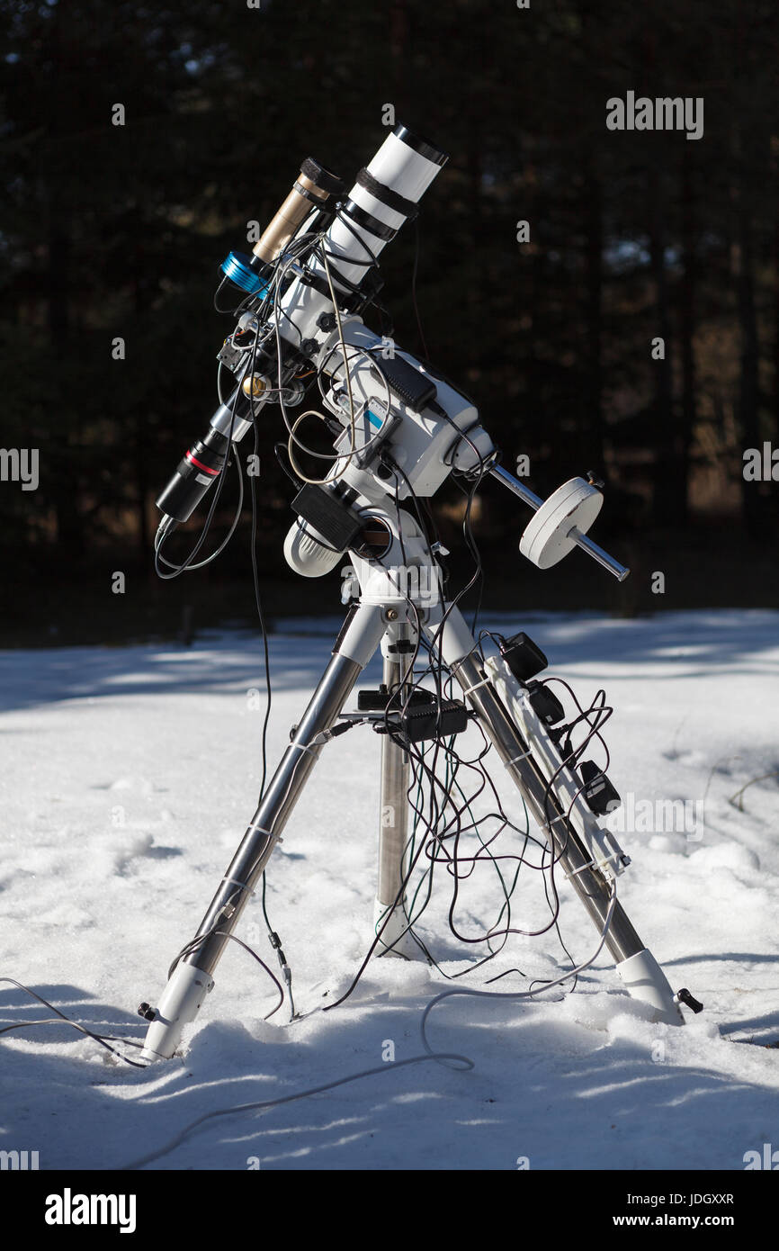 Professional astrophotography telescope equipped with guider scope and astro camera ready for night session Stock Photo
