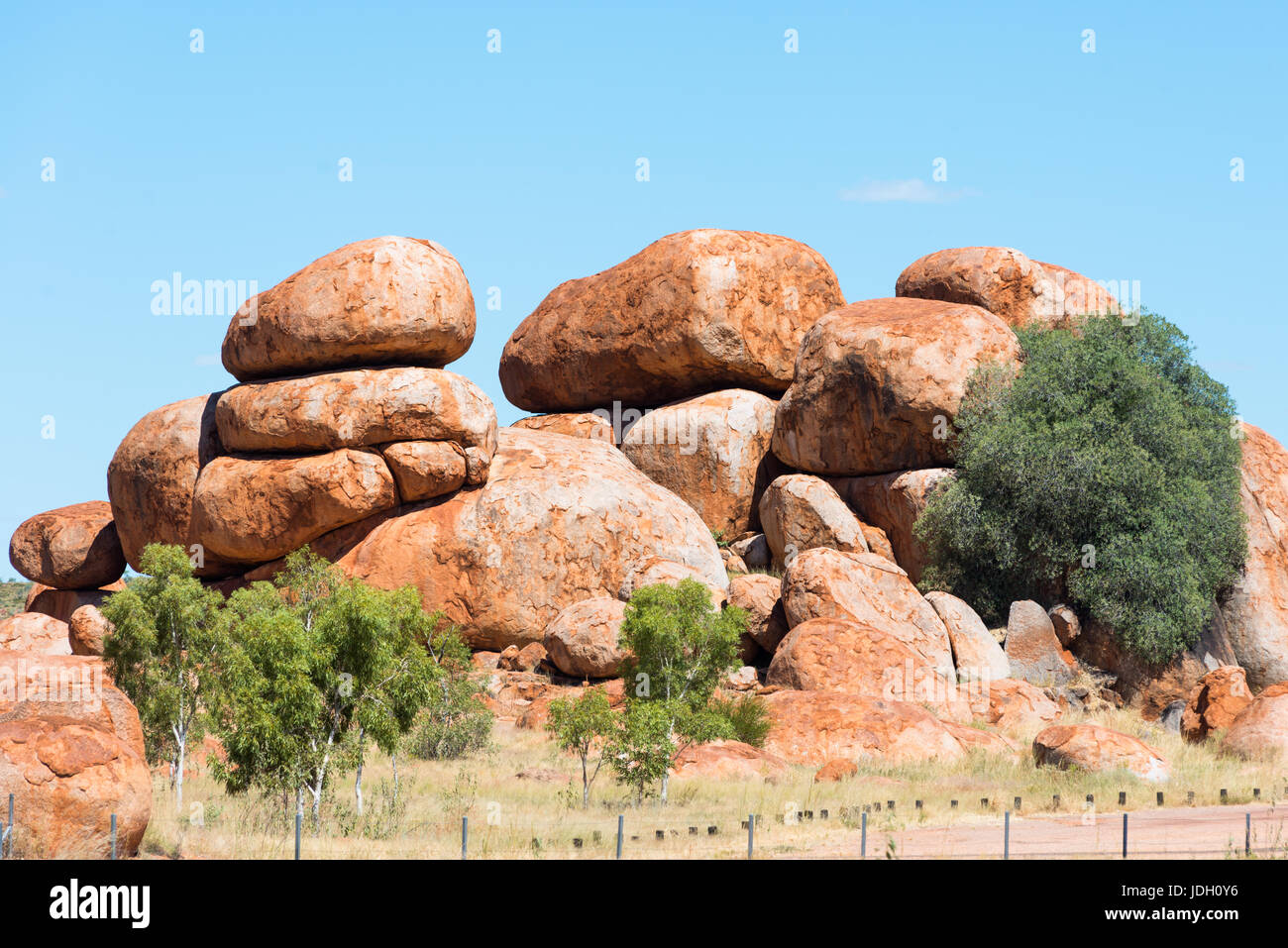 Devils Marbles - boulders of red granite are balanced on bedrock, Australia, Northern Territory. Stock Photo
