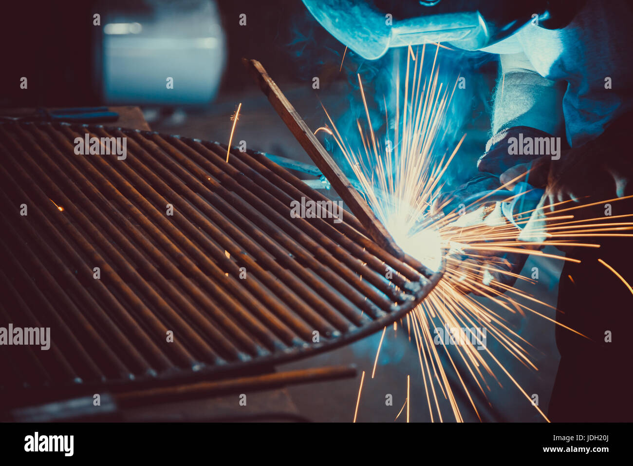 Welding Work. Erecting Technical Steel Industrial Steel Welder In Factory. Craftsman. Soft focus. Shallow DOF. Stock Photo