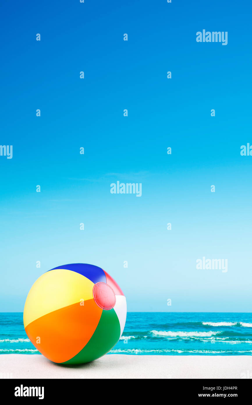 A beach ball on a beautiful white sand beach in summer Stock Photo Alamy