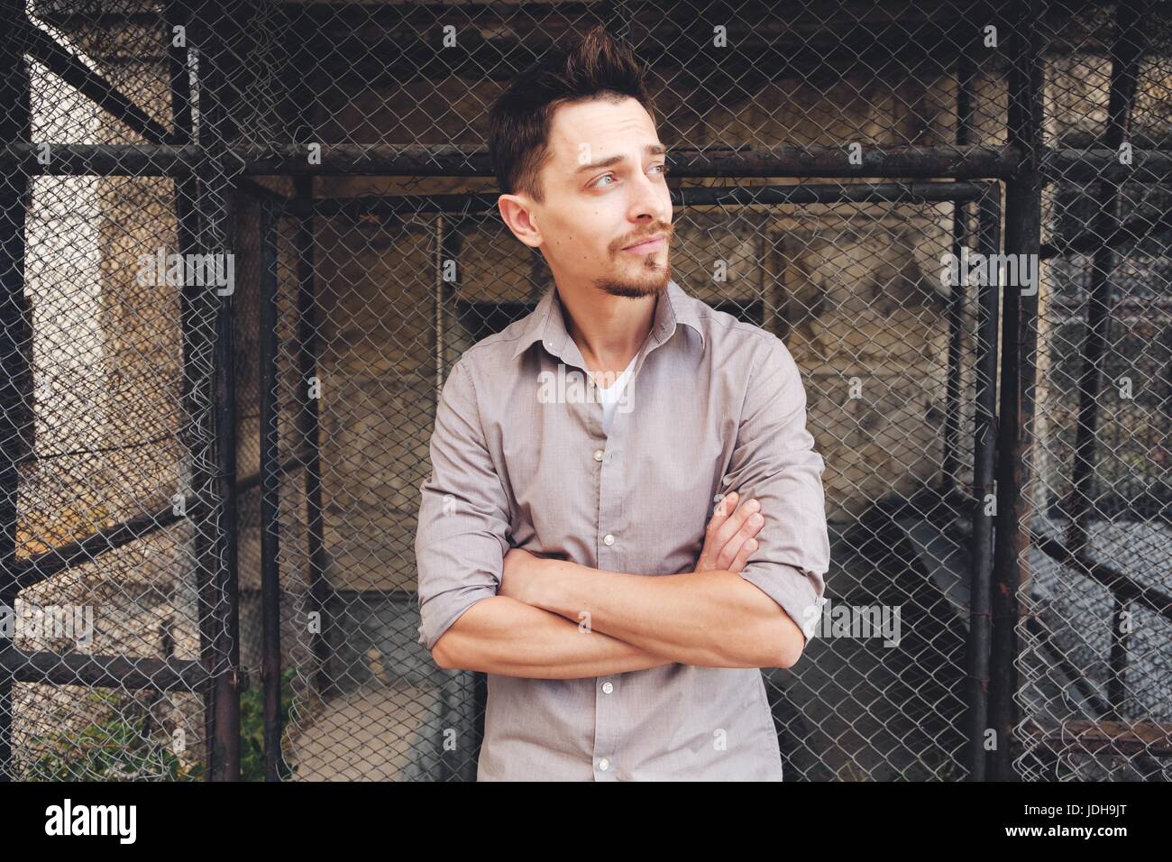 Handsome man outdoors portrait in the city. Warm colors Stock Photo - Alamy