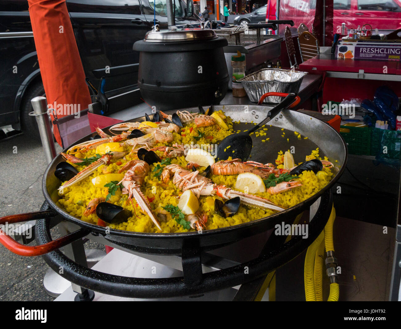 Large pan containing seafood paella in Bergen's iconic fish market Bryggen  Norway UNESCO World Heritage Site Stock Photo - Alamy