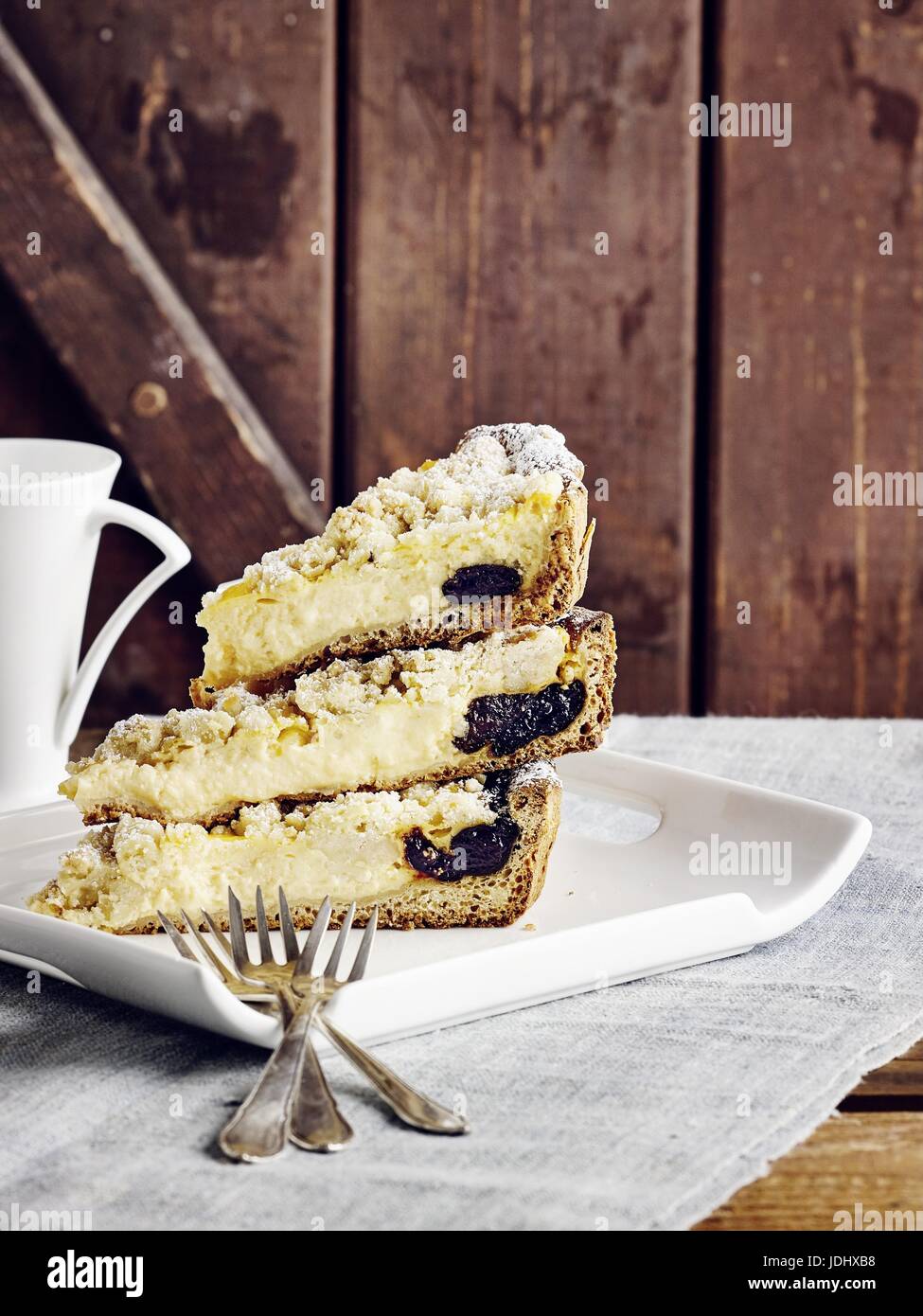 Pudding crumble cake with prunes Stock Photo Alamy