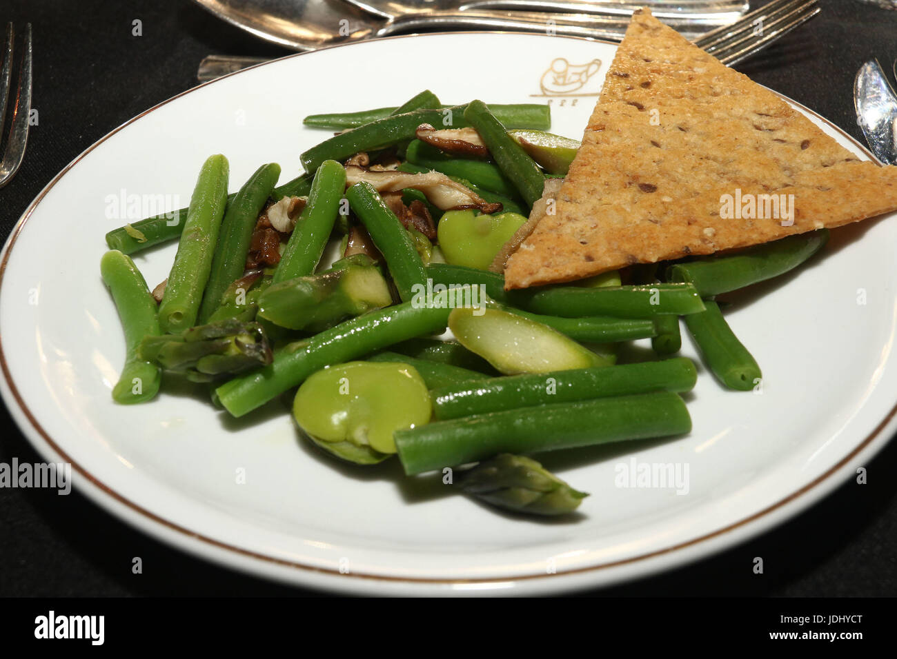Green bean, asparagus, mushroom salad with wheat cracker Stock Photo