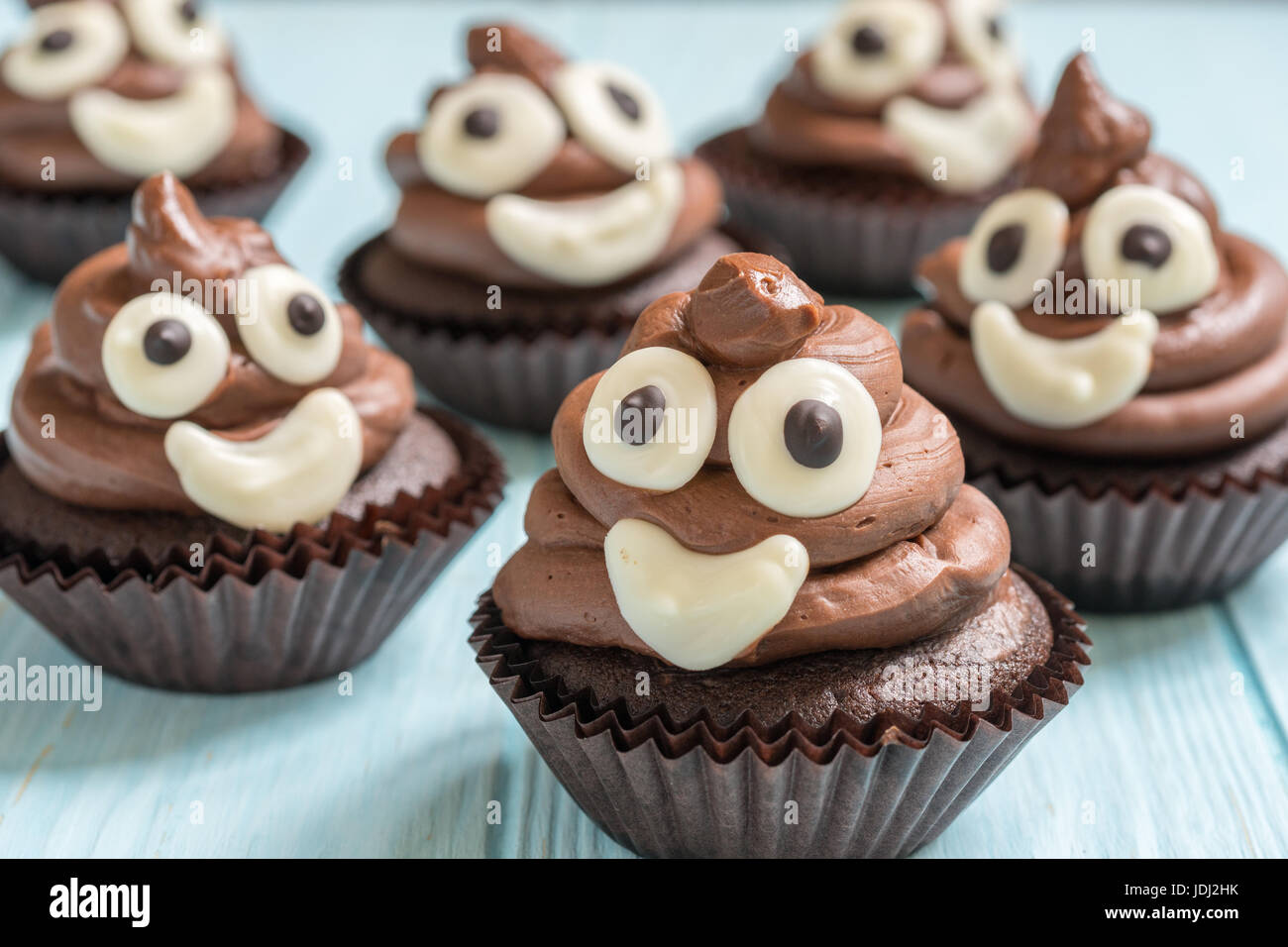 poop emoji cupcakes Stock Photo - Alamy
