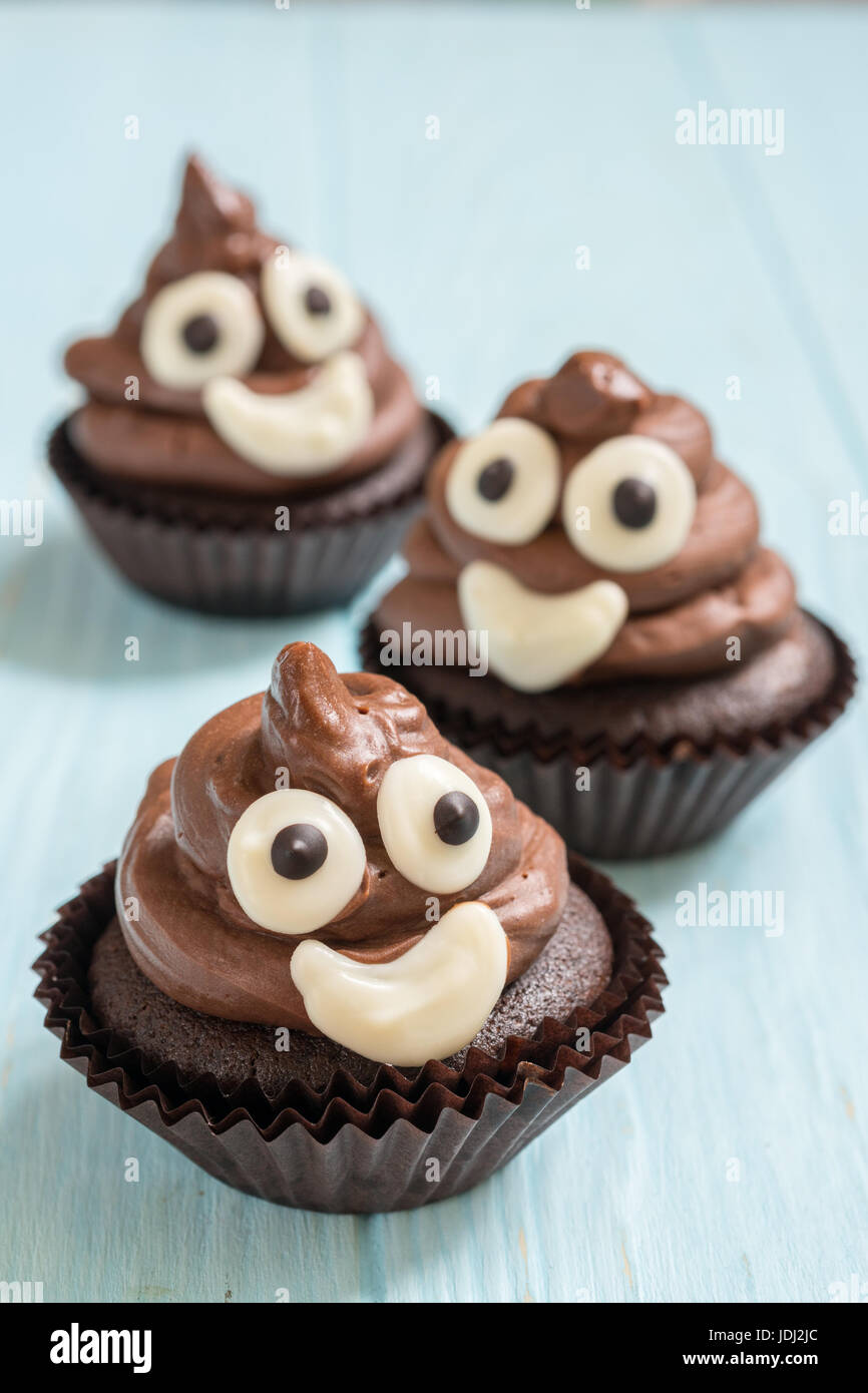 poop emoji cupcakes Stock Photo - Alamy