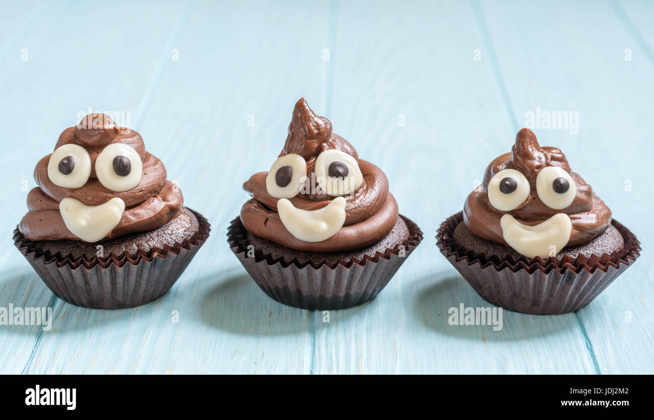 poop emoji cupcakes Stock Photo - Alamy