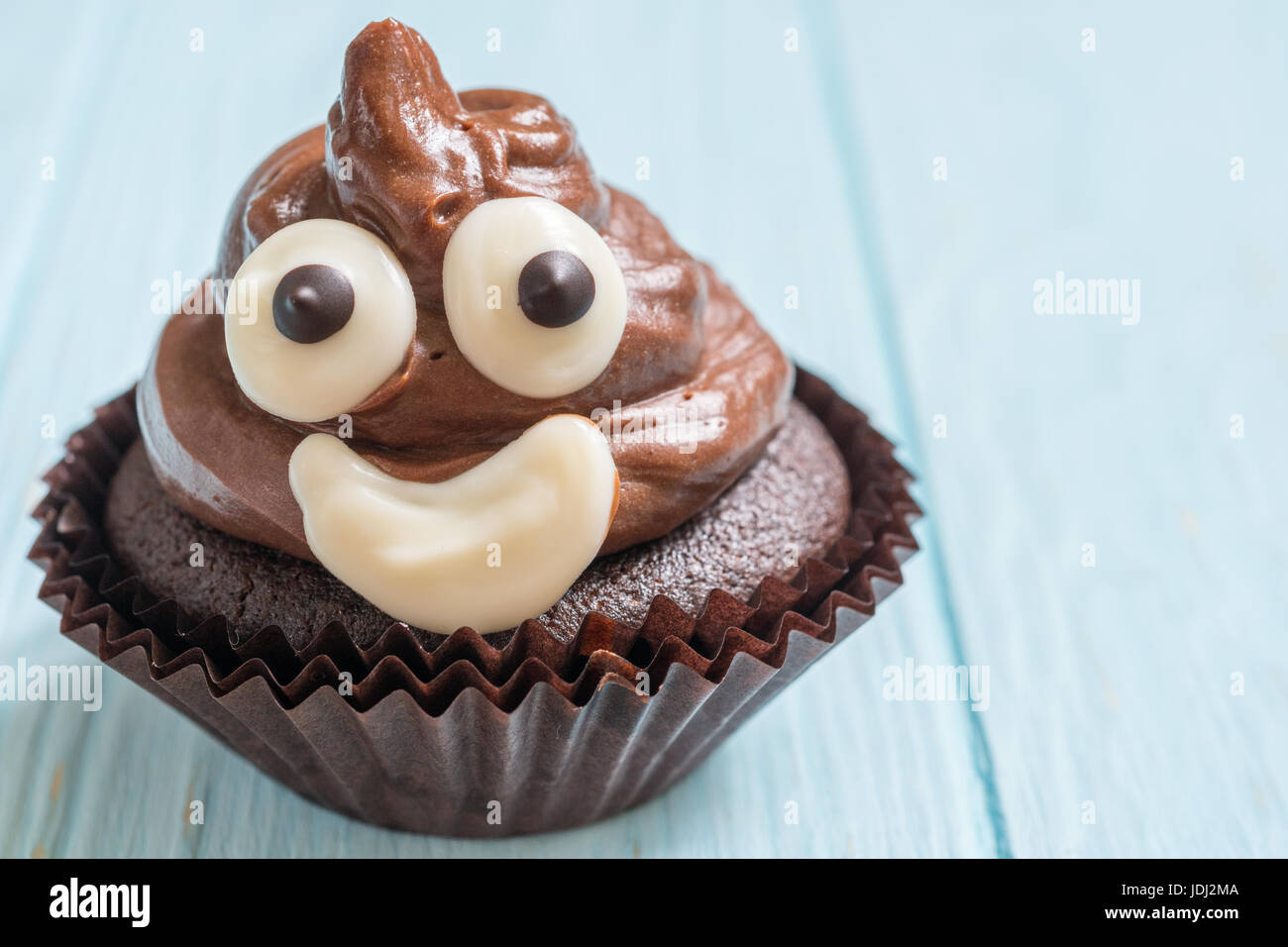 poop emoji cupcakes Stock Photo - Alamy