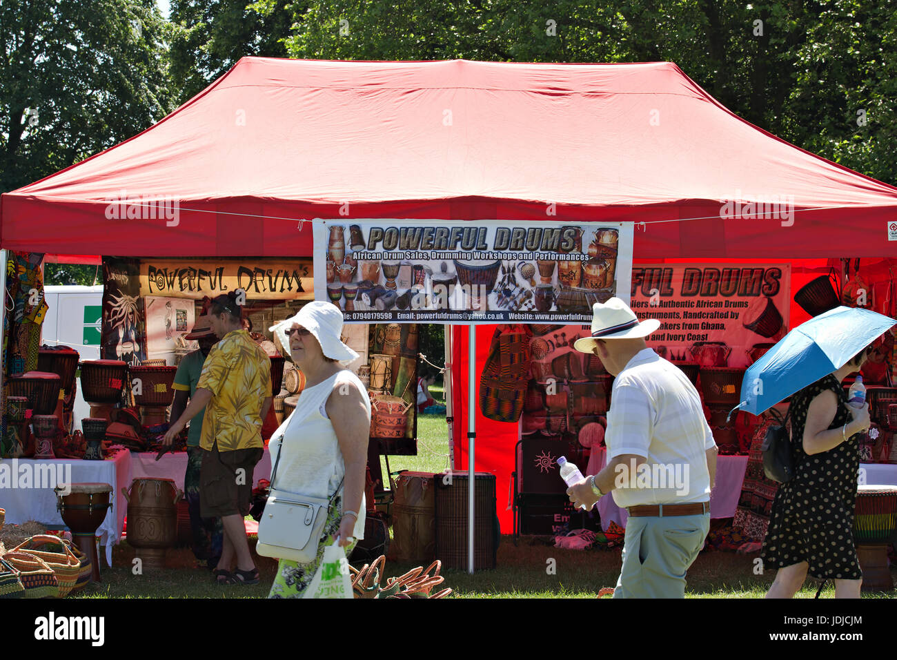 A stall selling African drums at the Africa Oye music festival in Sefton Park Liverpool UK Stock Photo