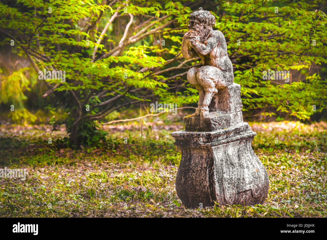 faun myth creature roman mythology poses legs statue Stock Photo