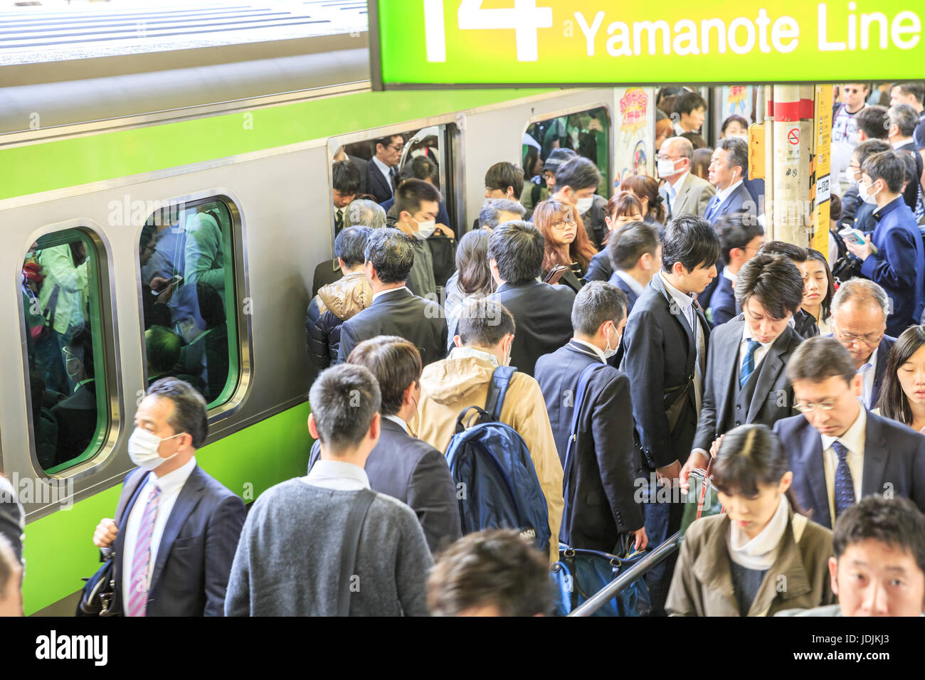 Commuters at Shinjuku Station Stock Photo