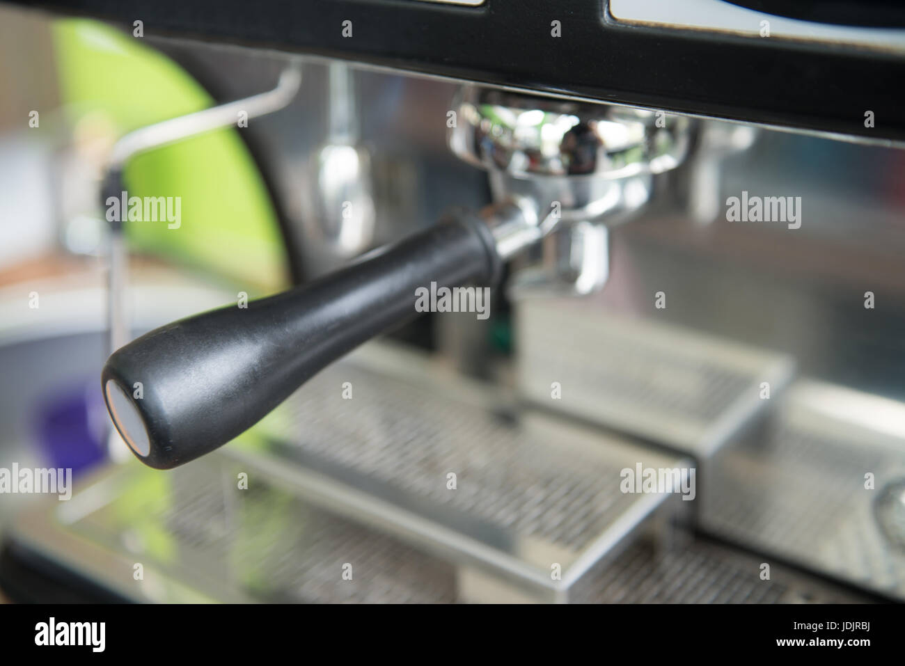 Close-up of Professional Coffee Machine Making Espresso in a Cafe Stock Photo