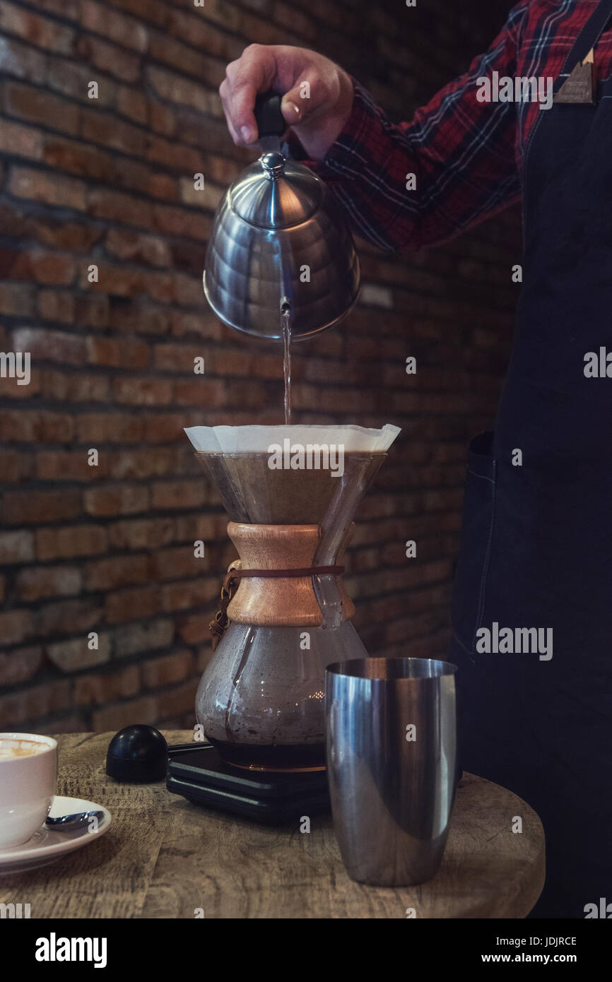 Barista brewing coffee Stock Photo