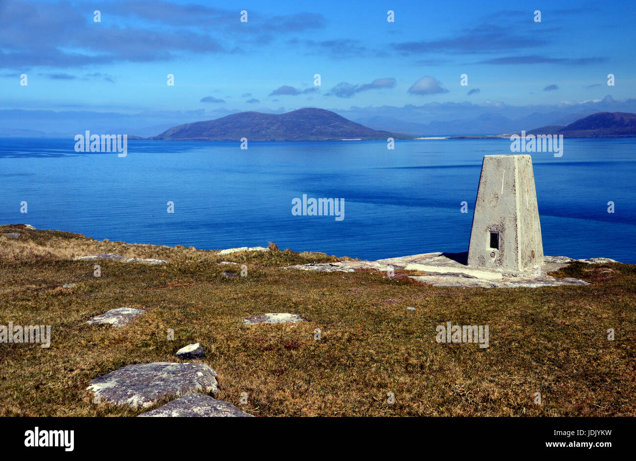 Looking over the Sound of Harris Towards Ceapabhal Hill from the Trig Point of Beinn Shleibhe on the Island of Berneray on North Uist, Outer Hebrides. Stock Photo