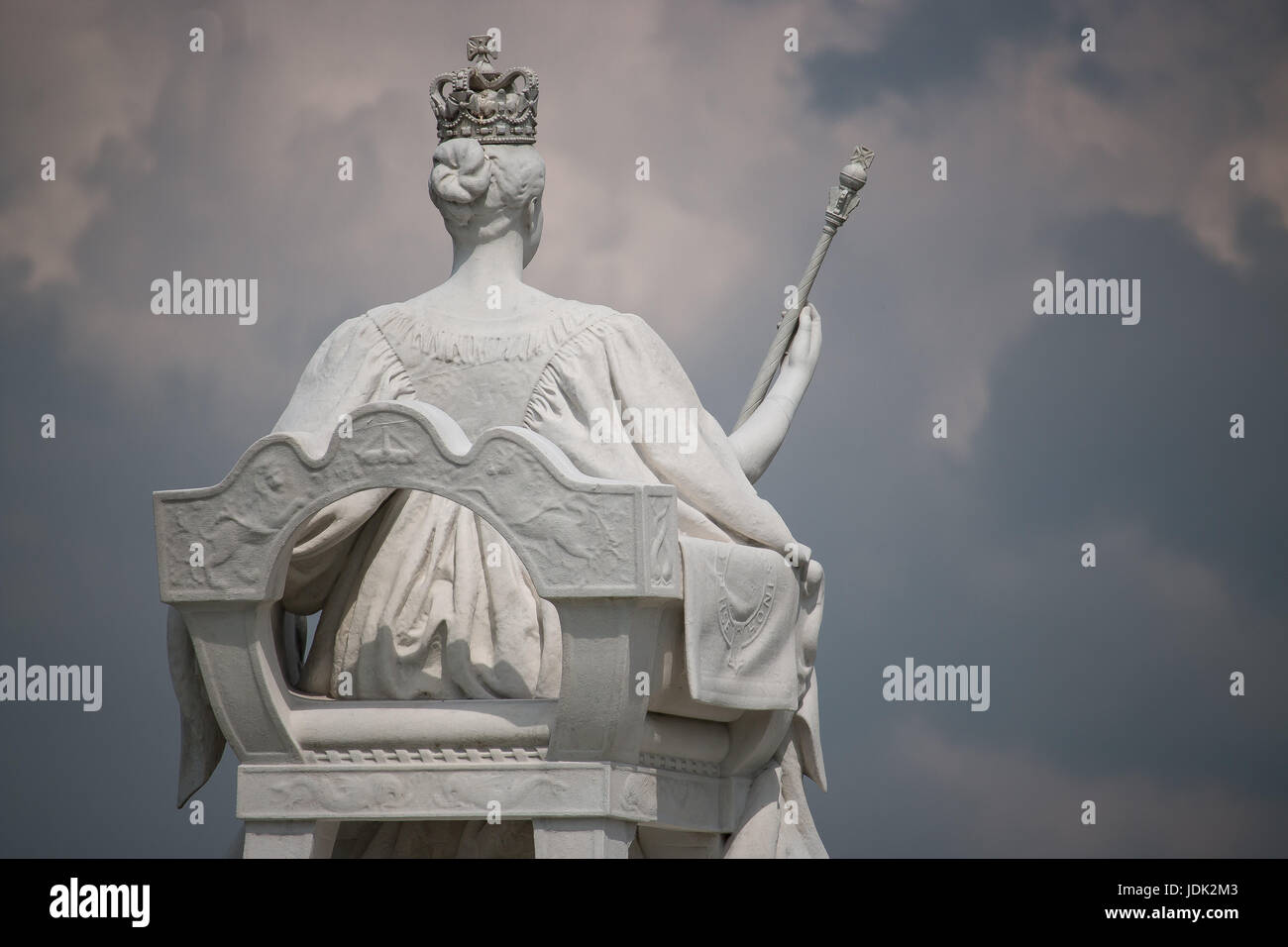 Just outside Kensington Palace sits a powerful statue of Victoria looking over the gardens where