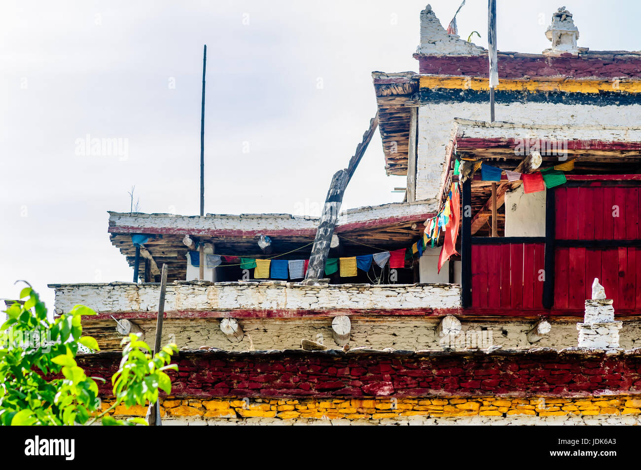 View on traditional tibetan house with prayer flags Stock Photo Alamy