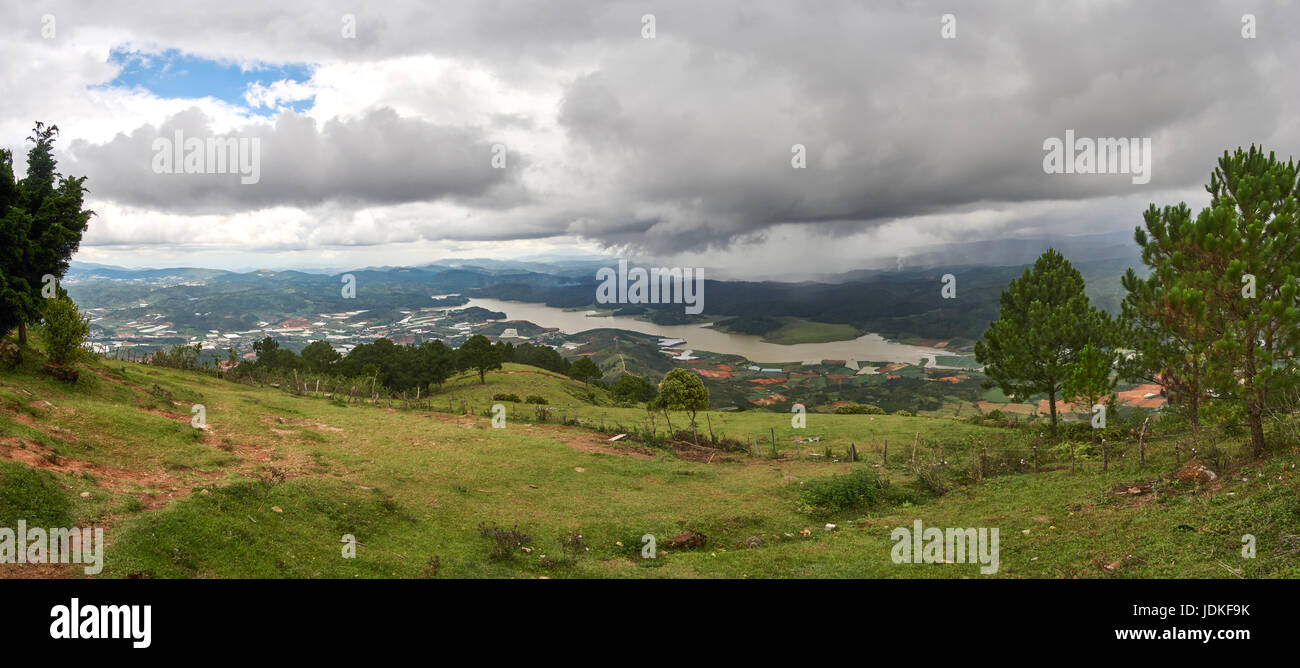 Wide view with storm and rain clouds from the mountain lang biang in Da-lat, Vietnam Stock Photo